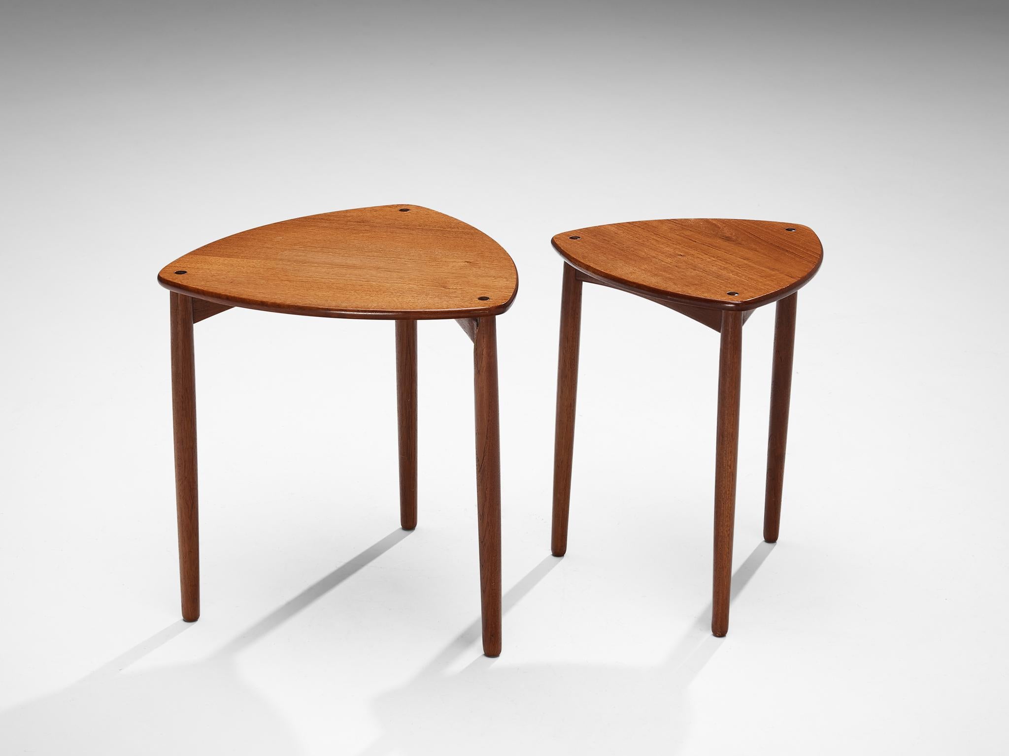 Ejner Larsen and Aksel Bender Madsen for Willy Beck, pair of nesting tables, teak, Denmark, 1950s.

Elegant pair of nesting tables by the Danish designer duo Ejner Larsen and Aksel Bender Madsen. Each table has a triangular shaped top with a soft,