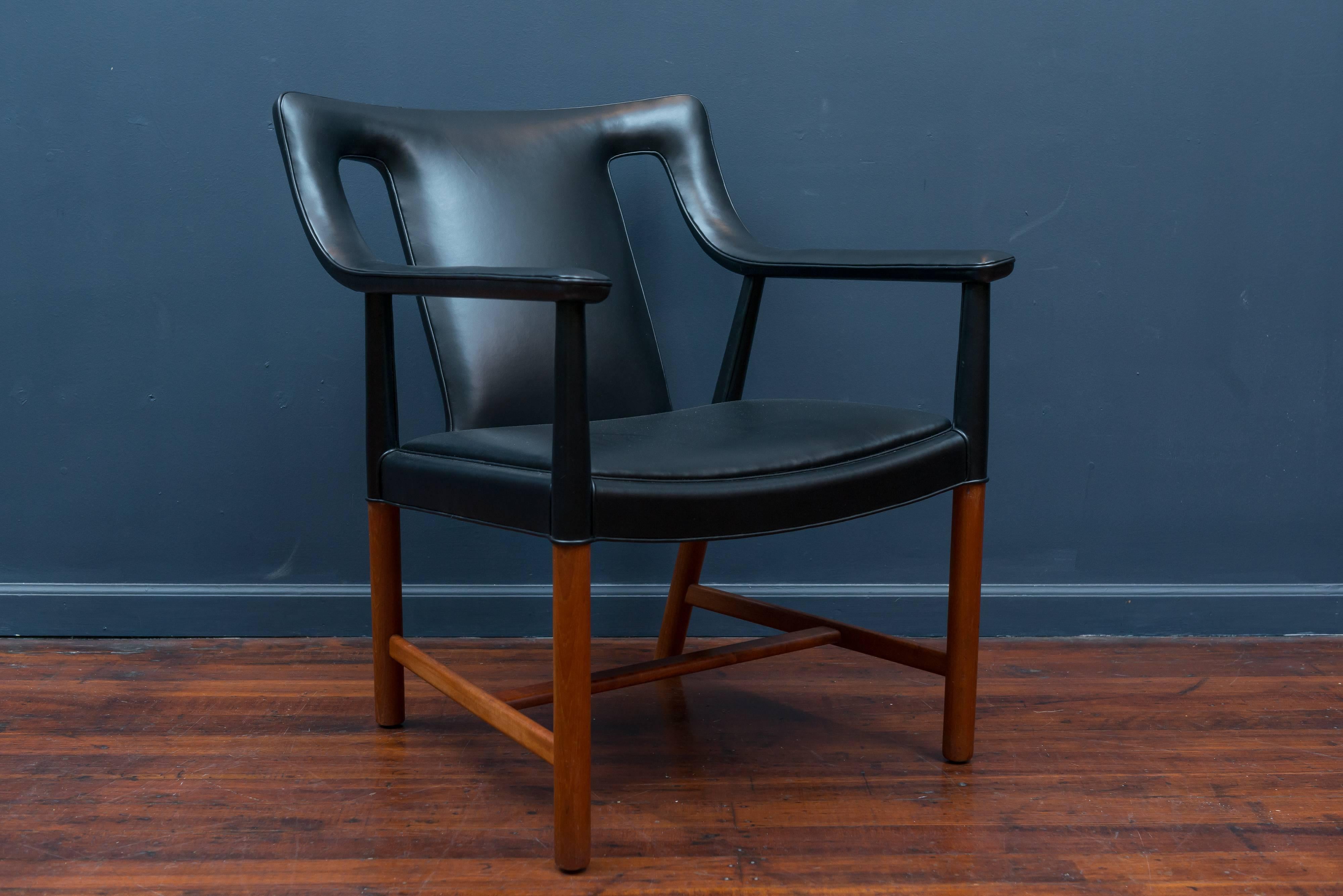 Ejner Larsen and Askel Bender Madsen design teak lounge chair model LP48 for Ludvig Pontoppidan, Denmark. Perfectly re-upholstered in new Italian black leather, labelled.