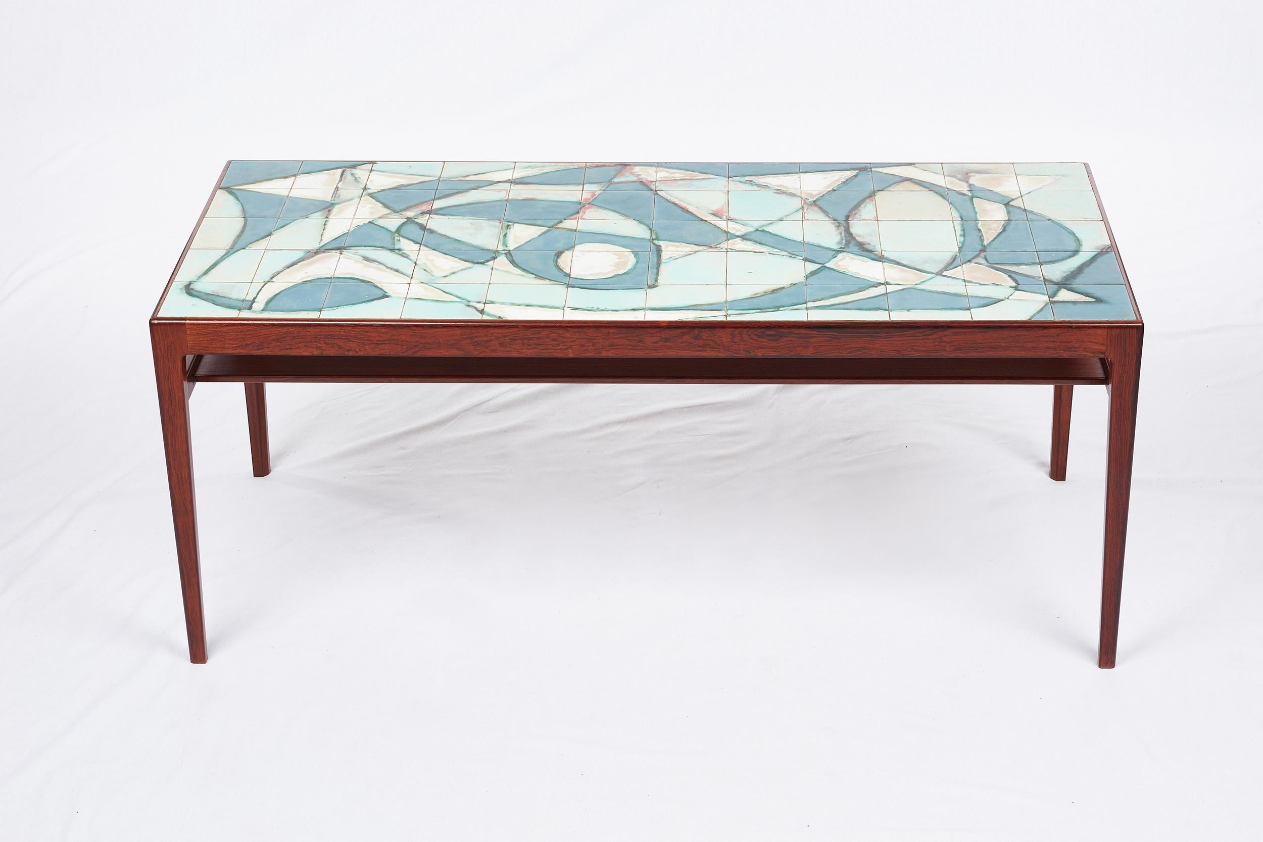 Ejner Larsen & Askel Bender Madsen rosewood tile coffee table. Fabulous abstract work of art. Designed in 1955. Produced by Ludvig Pontoppidan.