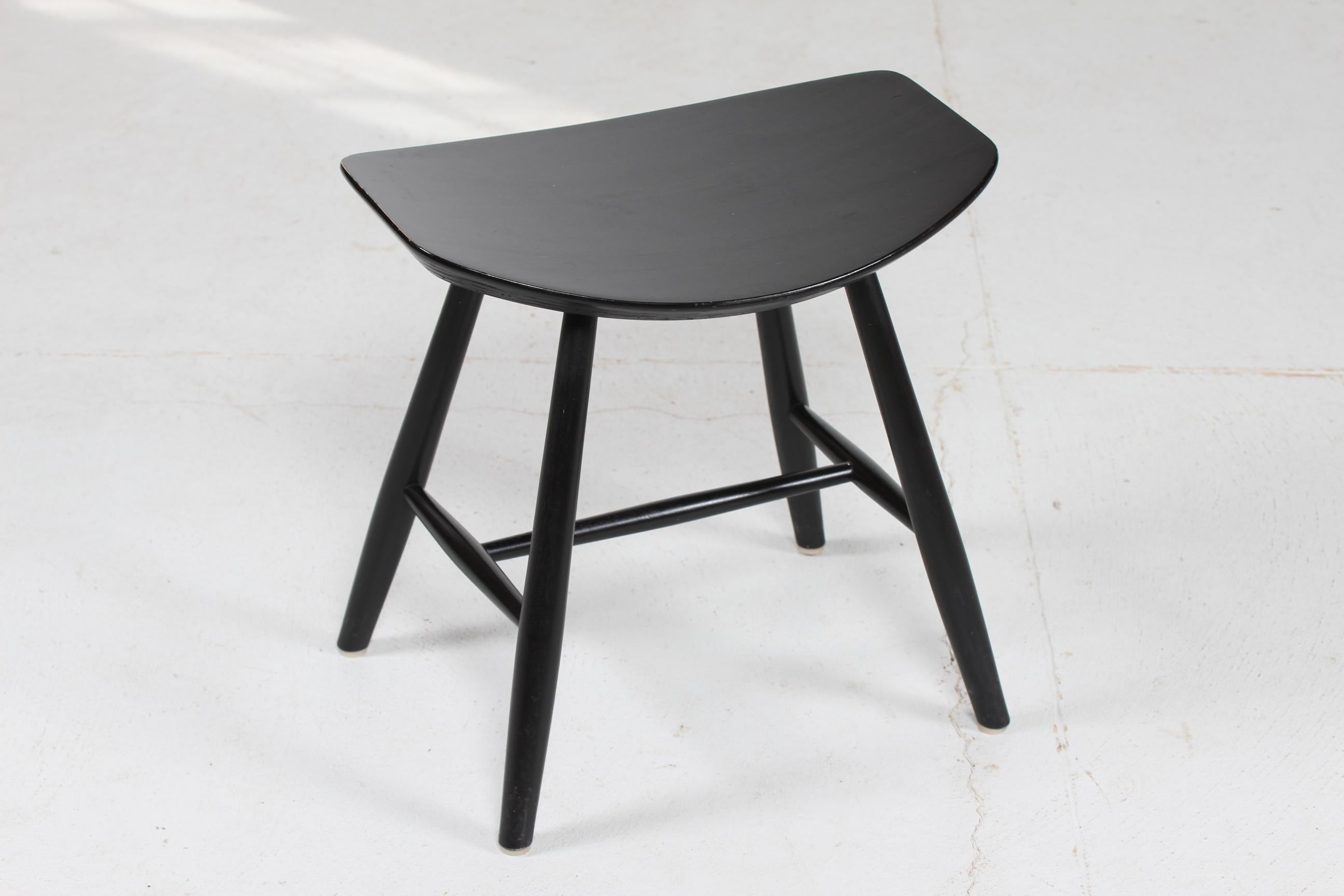 Stool model no. J 63 designed by the Danish cabinet maker Ejvind A Johansson (1923-2002) made for FDB Møbler Denmark in the 1950´s

The stool is made of solid beech with black lacquer

Nice vintage condition with patina - see photos of small