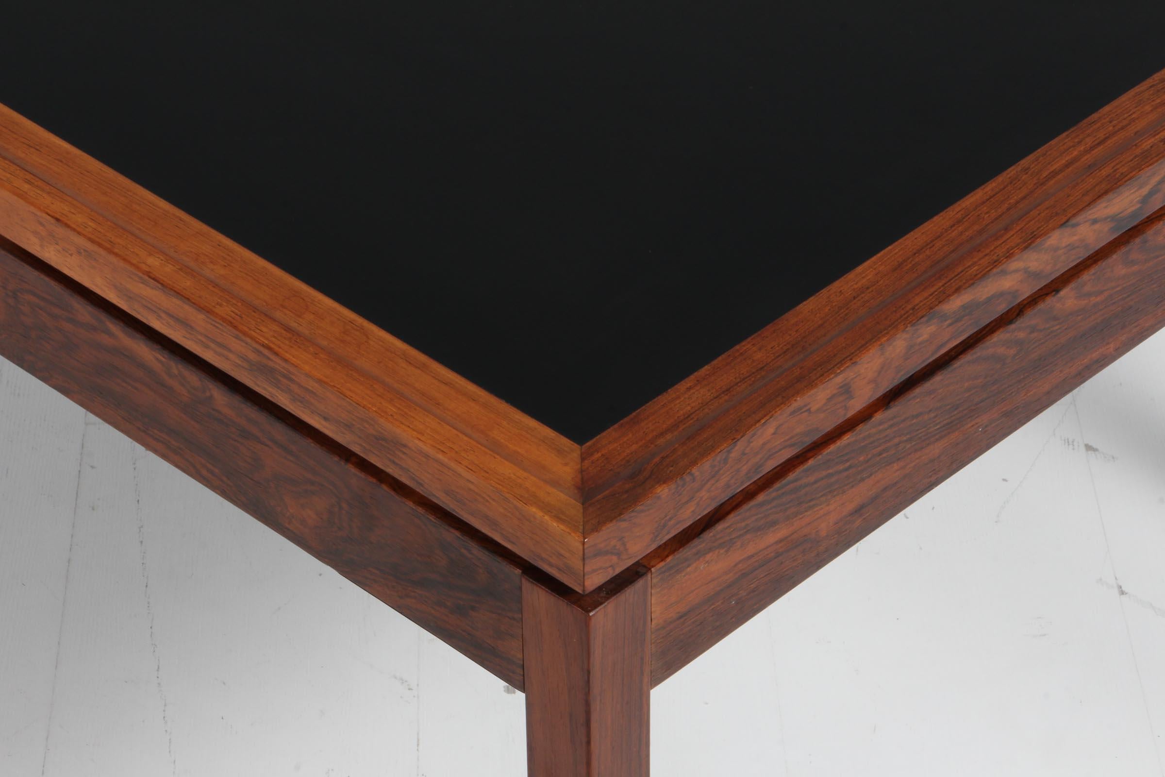 Scandinavian Modern Ejvind A. Johansson coffee table rosewood and black formica, 1960s Denmark For Sale