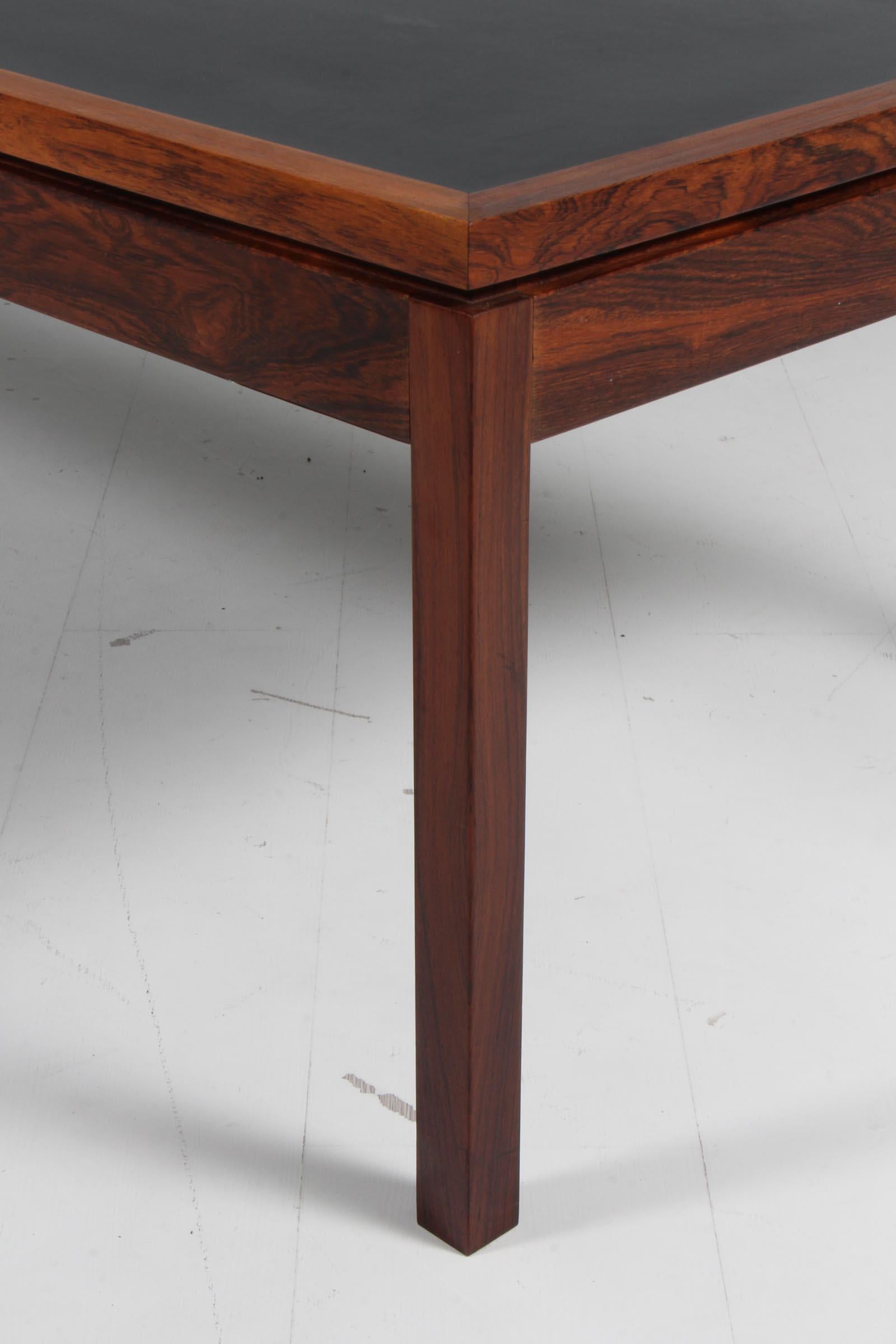 Danish Ejvind A. Johansson coffee table rosewood and black formica, 1960s Denmark For Sale