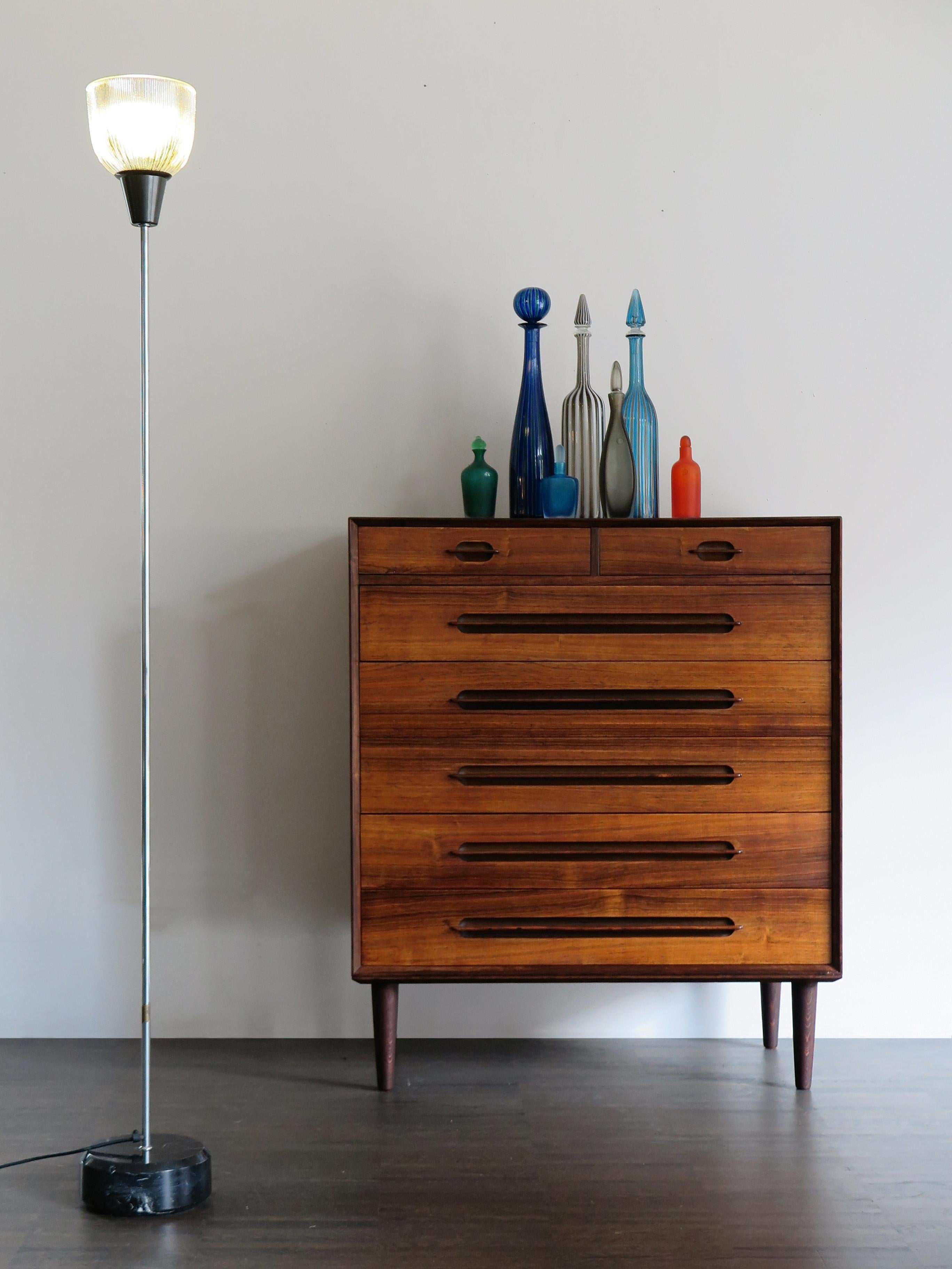 Scandinavian dark wood chest of drawers designed by Danish artist Ejvind A. Johansson for Gern Møbelfabrik, circa 1960.

Please note that the item is original of the period and this shows normal signs of age and use.