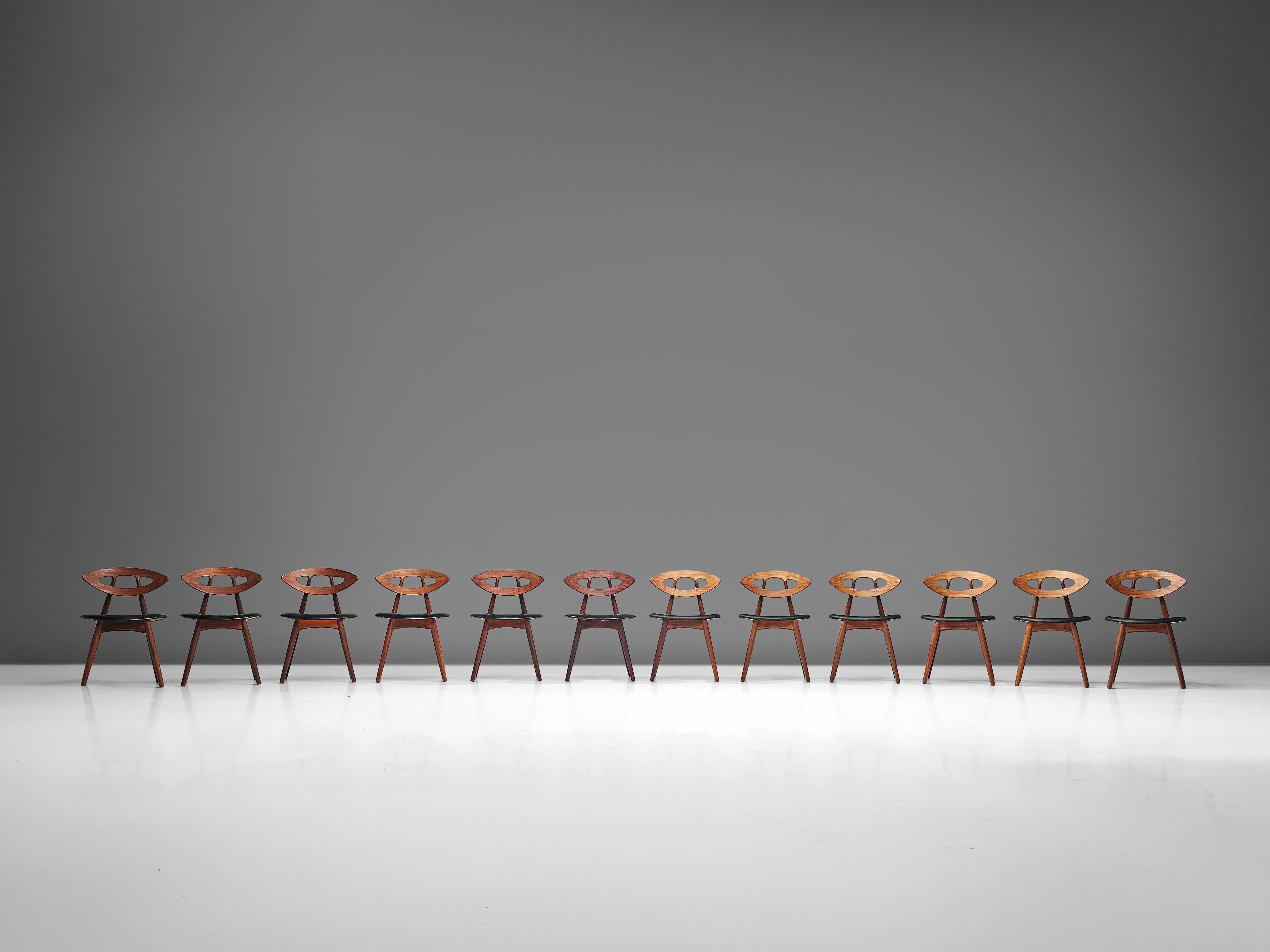 Ejvind A. Johansson, set of 12 dining chairs, ‘Eye’ model ‘84’, teak, black leather, Denmark, designed in 1961

Wonderful and exclusive set of 12 ‘Eye’ chairs by Danish designer Ejvind Johansson. Characteristic is the oval 'eye' shaped backrest.