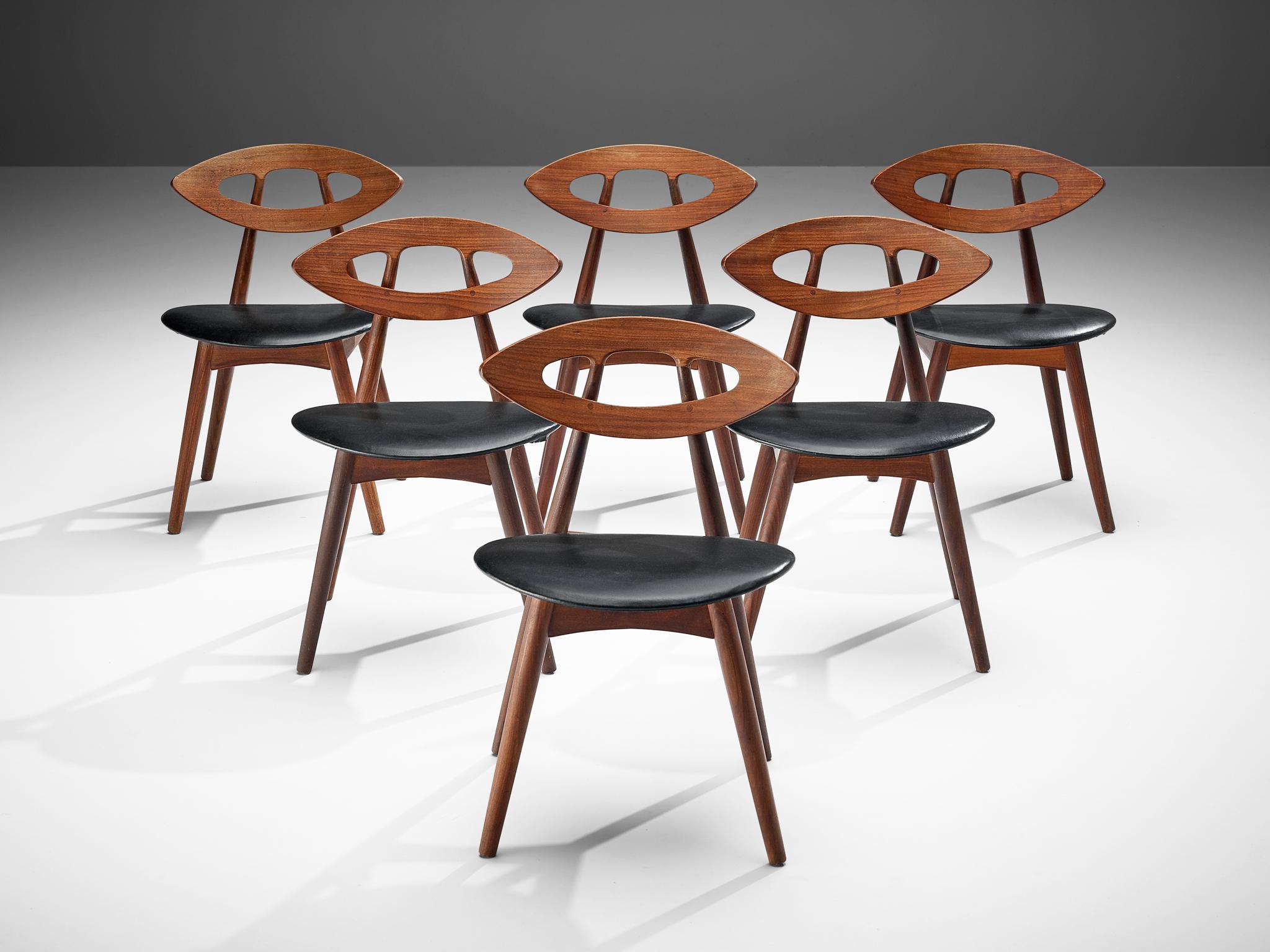 Ejvind A. Johansson for Ivan Gern Møbelfabrik, set 6 of dining chairs model 84 'eye,' teak, black leatherette, Denmark, design 1961, production 1970s.

Wonderful and exclusive set of six 'eye' chairs by Danish designer Ejvind Johansson.