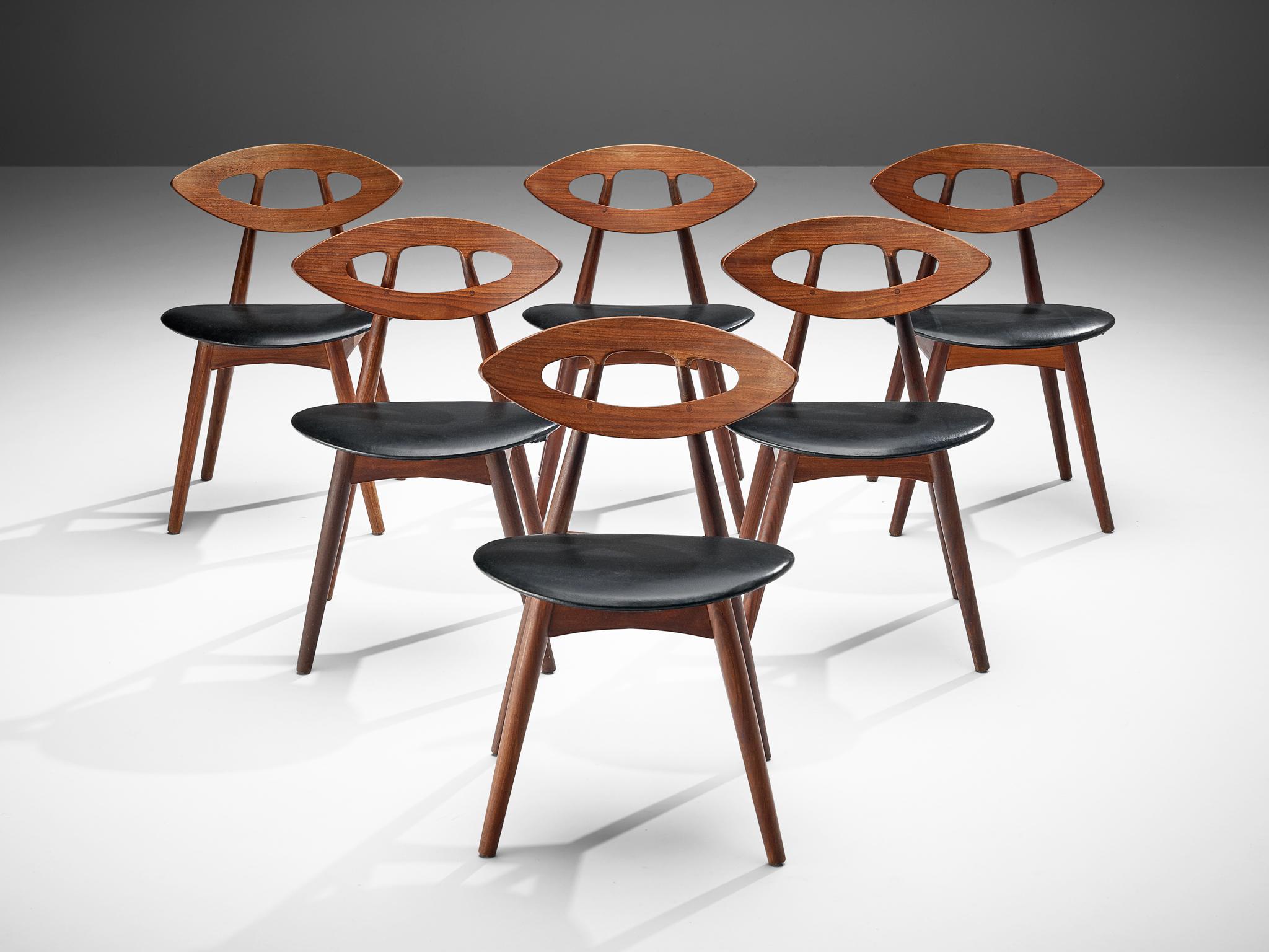 Ejvind A. Johansson for Ivan Gern Møbelfabrik, set of eight dining chairs model 84 'Eye,' in teak and black leather, Denmark, design 1961, production 1970s.

Wonderful and exclusive set of six eye chairs by Danish designer Ejvind Johansson as part