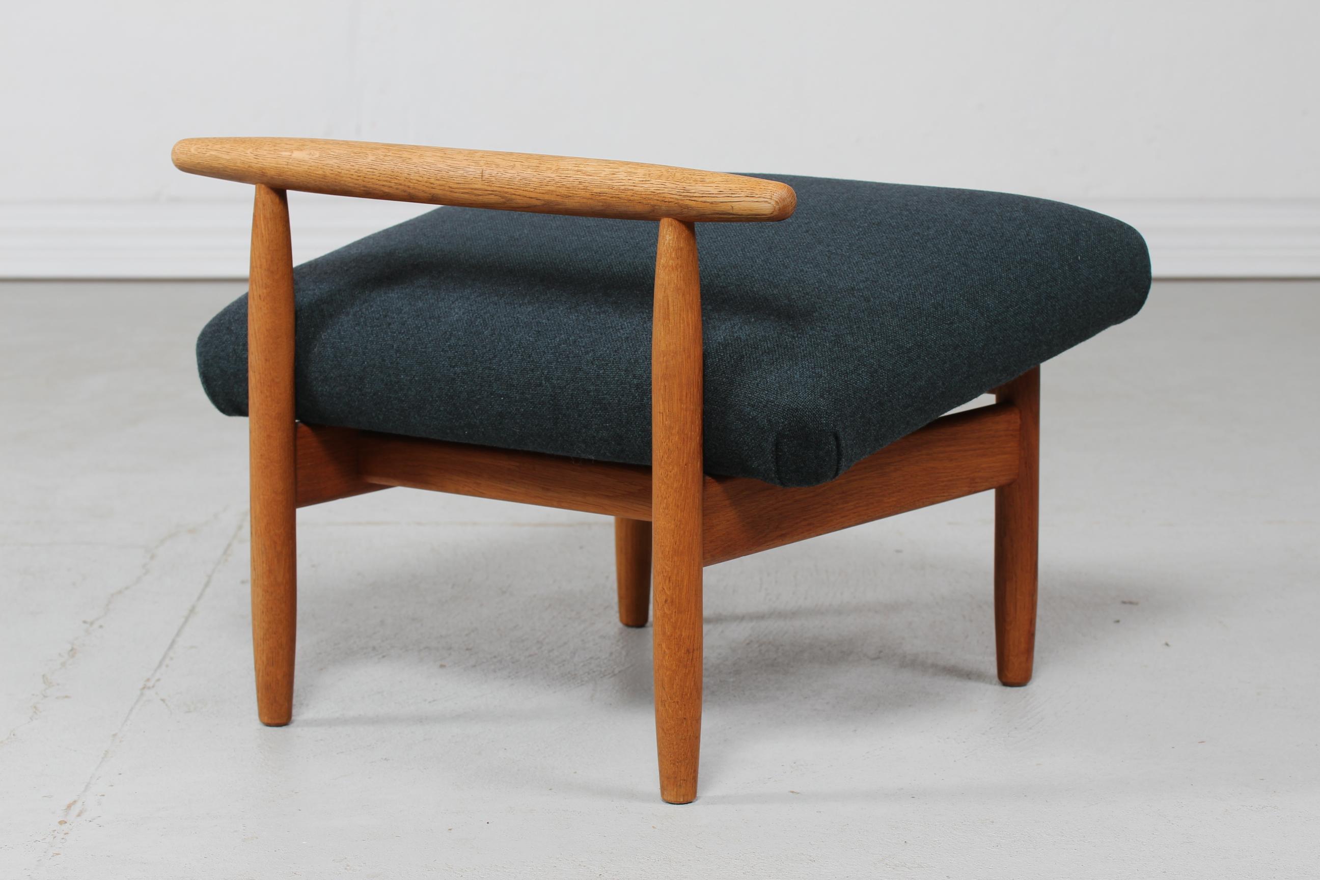 Mid-Century Modern Ejvind A Johansson Stool Model no. J 65 for FDB Denmark Made of Oak in 1950s