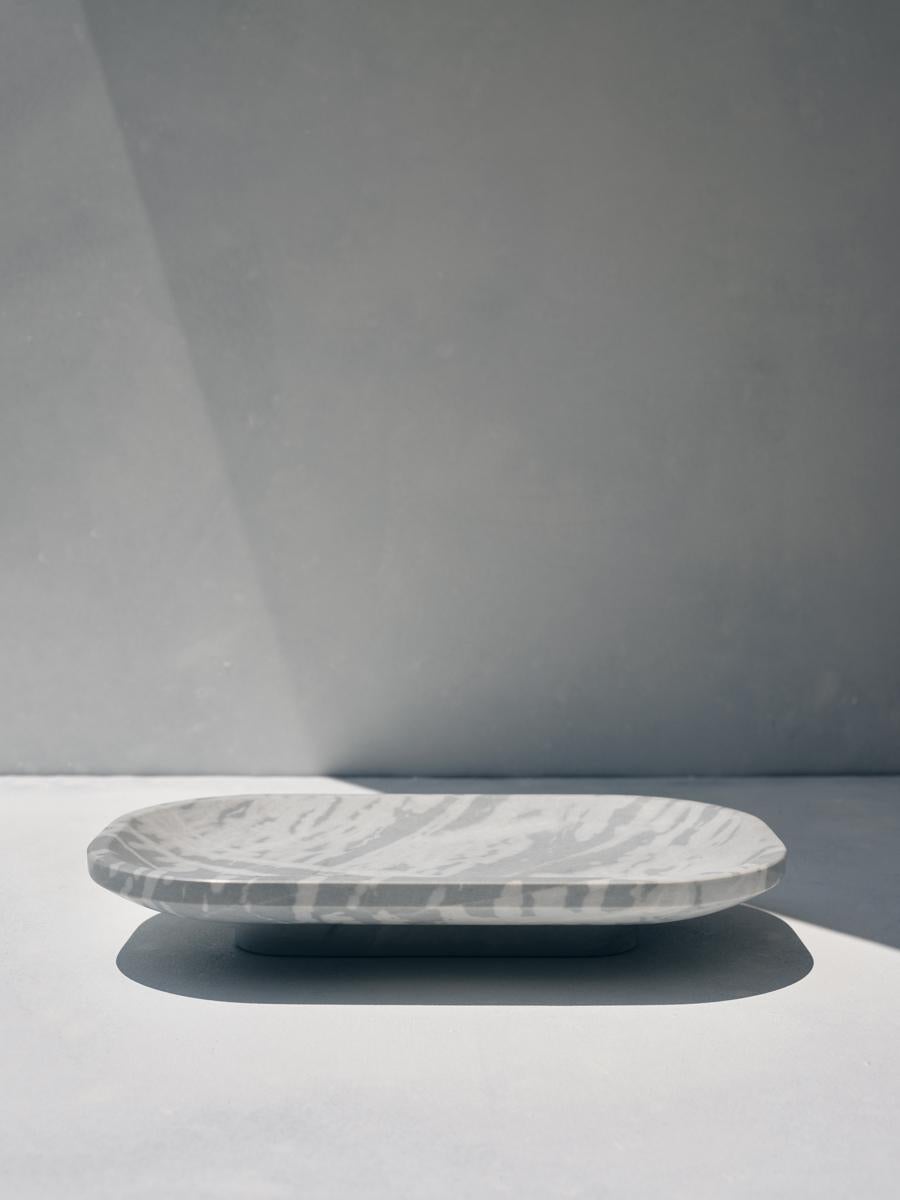 Ekali bowl-tray by Faye Tsakalides.
Dimensions: 21 W x 32 L x 5 H cm
Materials: Lais marble.
Technique: Crafted from a single piece of marble. Hand-crafted, Polished. Mat finished. 


Faye Tsakalides is a Greek architect and designer based in