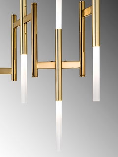 Suspension longue Eklè avec finition en métal bronze et or brossé