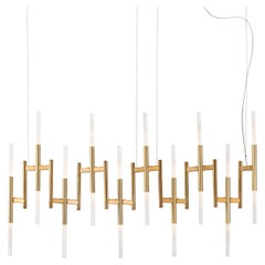 Suspensión larga Eklè con acabado metálico en bronce y oro cepillado