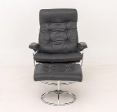 Ekornes Gray Leather Lounge Chair and Ottoman