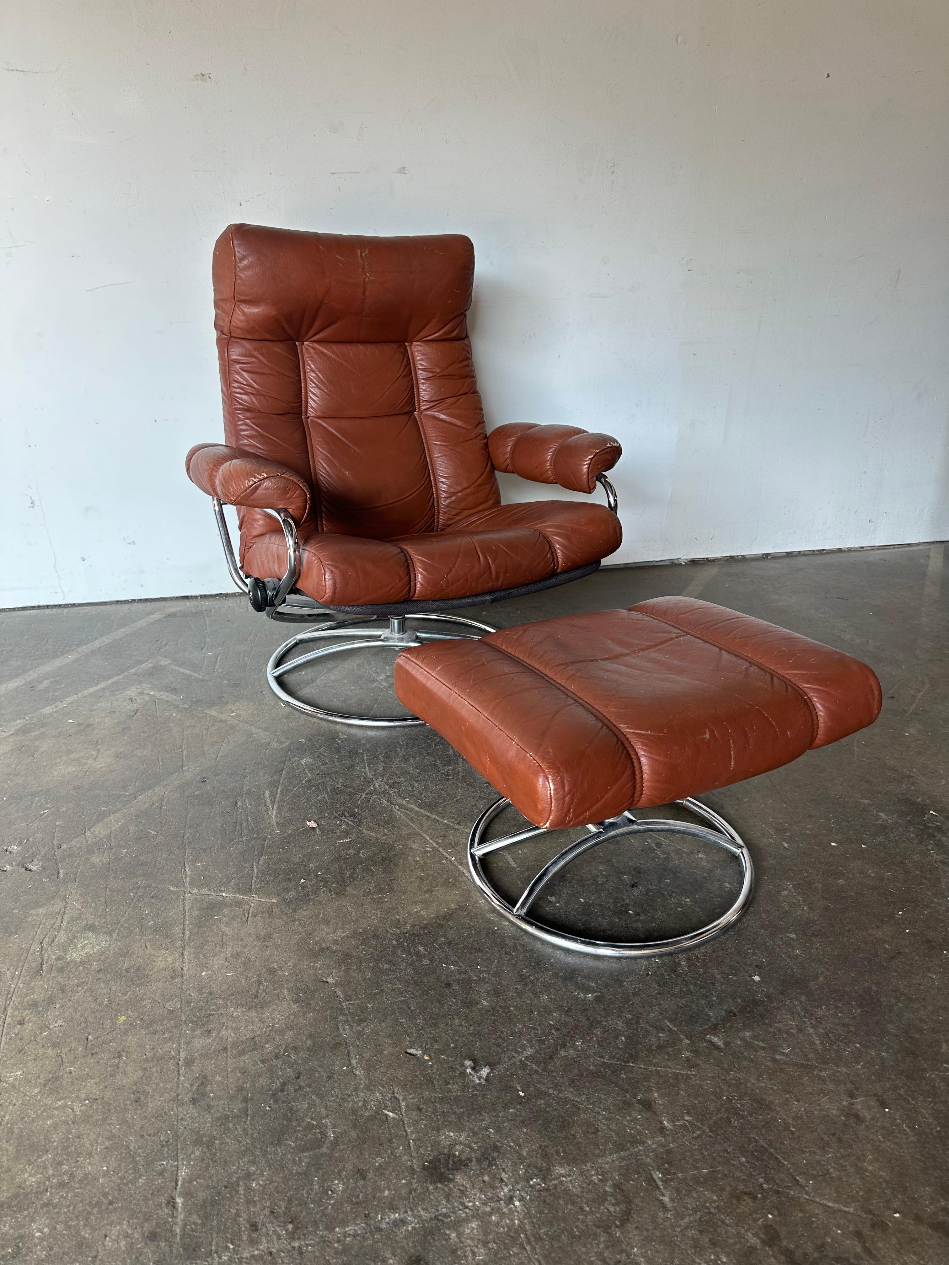 Metal Ekornes Leather Stressless Lounge Chair and Ottoman in Burnt Orange For Sale