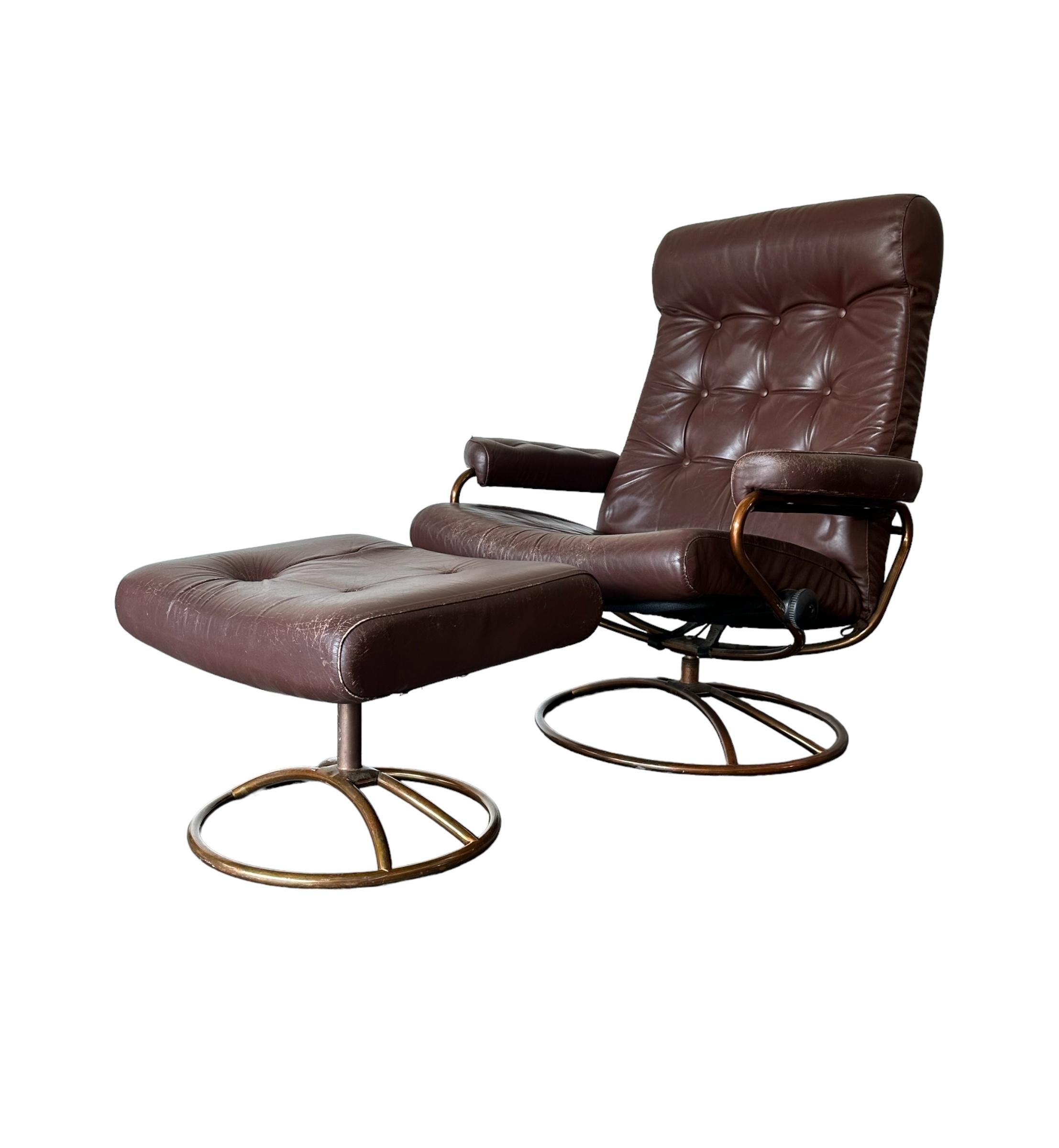 Classic Ekornes Stressless lounge chair and ottoman. Leather cushions on bronze colored swivel bases. No tears in leather. Normal signs of use. Multiple adjustable angles to sit up, lounge, and lie nearly flat. One of the most comfortable lounge