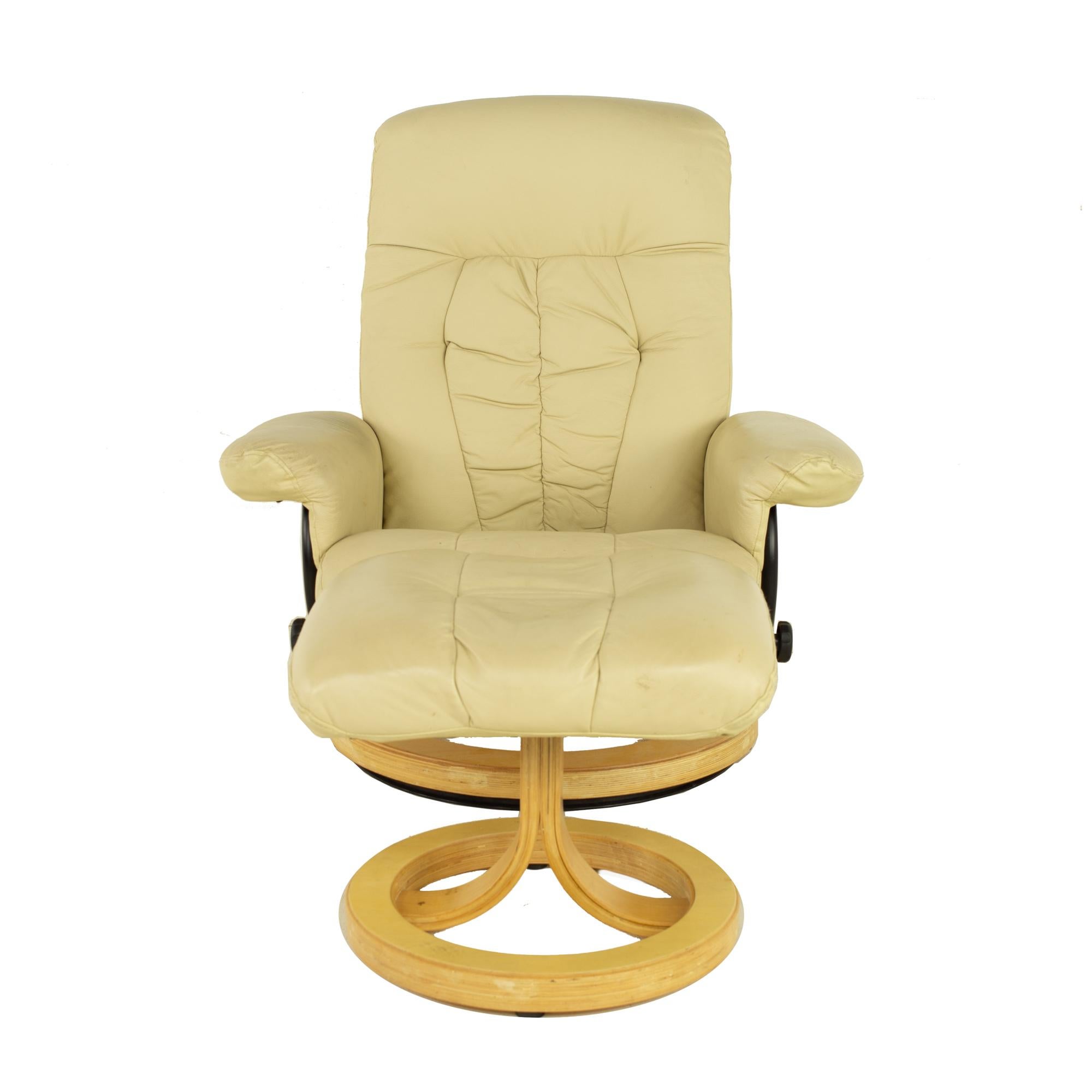 Ekornes Stressless Style Mid Century Leather Lounge Chair and Ottoman

This chair measures: 35 wide x 29 deep x 38 inches high, with a seat height of 14 and arm height of 23 inches, with ottoman 45 inches deep

All pieces of furniture can be had in
