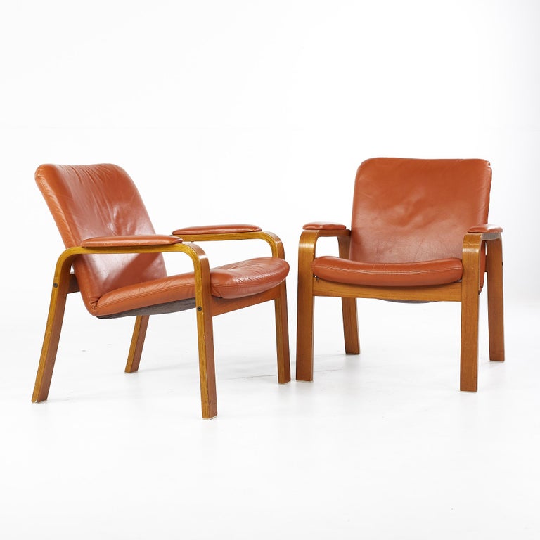 Ekornes mid century teak and leather occasional lounge chairs - pair

These chairs measure: 27.5 wide x 32 deep x 31 high, with a seat height of 18 and arm height of 21 inches

All pieces of furniture can be had in what we call restored vintage