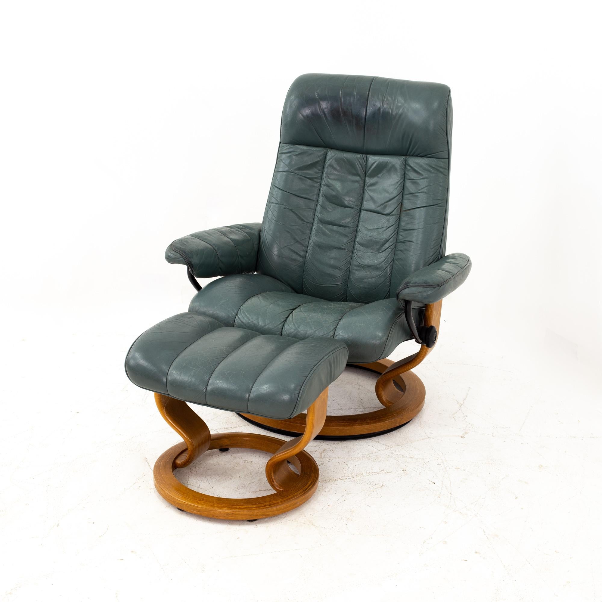 Ekornes midcentury gray stressless lounge chair and ottoman
Chair measures: 33 wide x 26 deep x 39.5 high, with a seat height of 16 inches
Ottoman measures: 21.5 wide x 18 deep x 15 high

Each piece of furniture is available in what we call