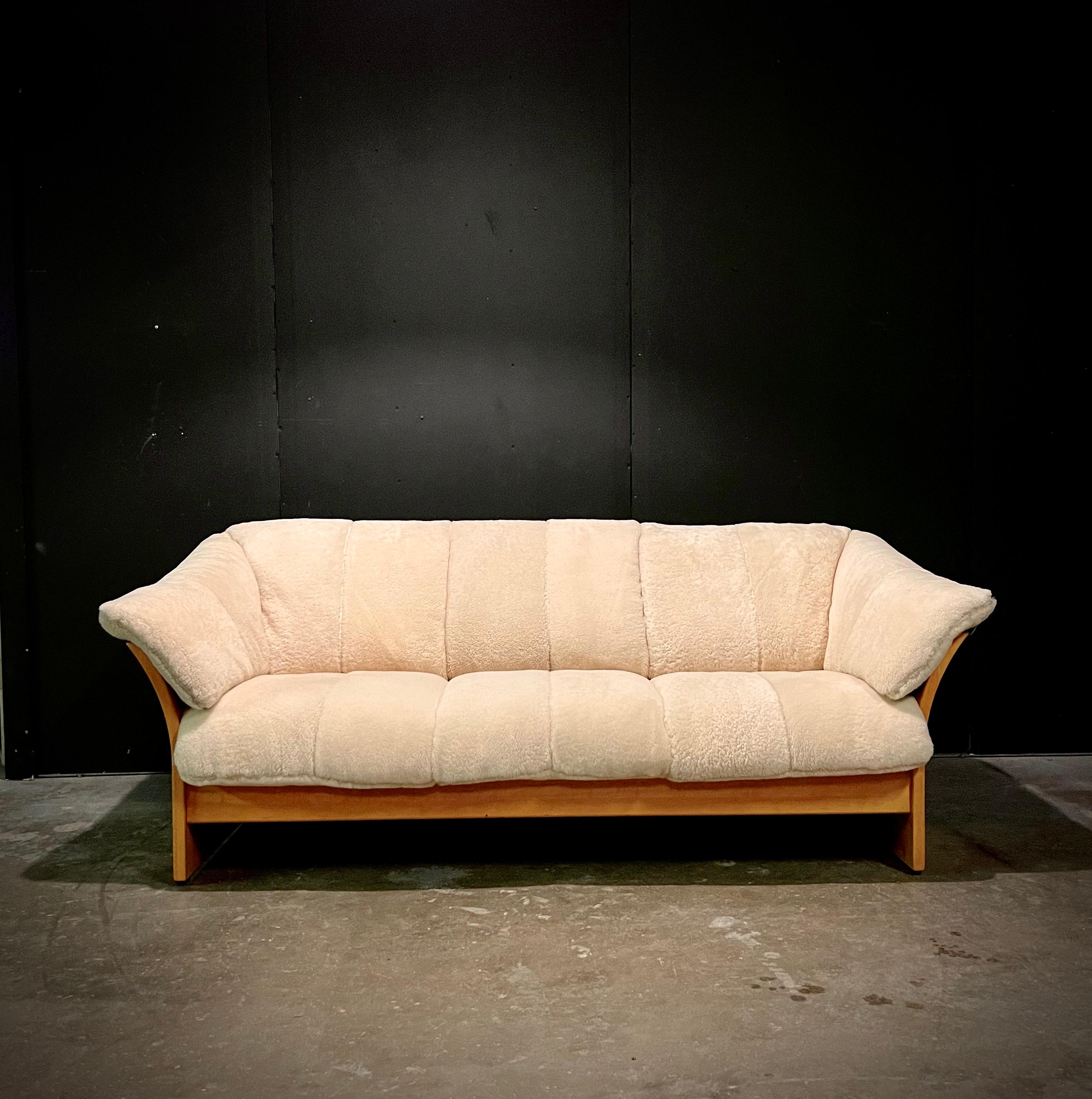 This sofa has been elevated to the next level! Simple, beautiful Scandinavian design merges with soft, cozy European sheepskin to make this perfectly comfortable sofa. Pair it with one (or two!) of our Postmodern European Sheepskin Lounge chairs.