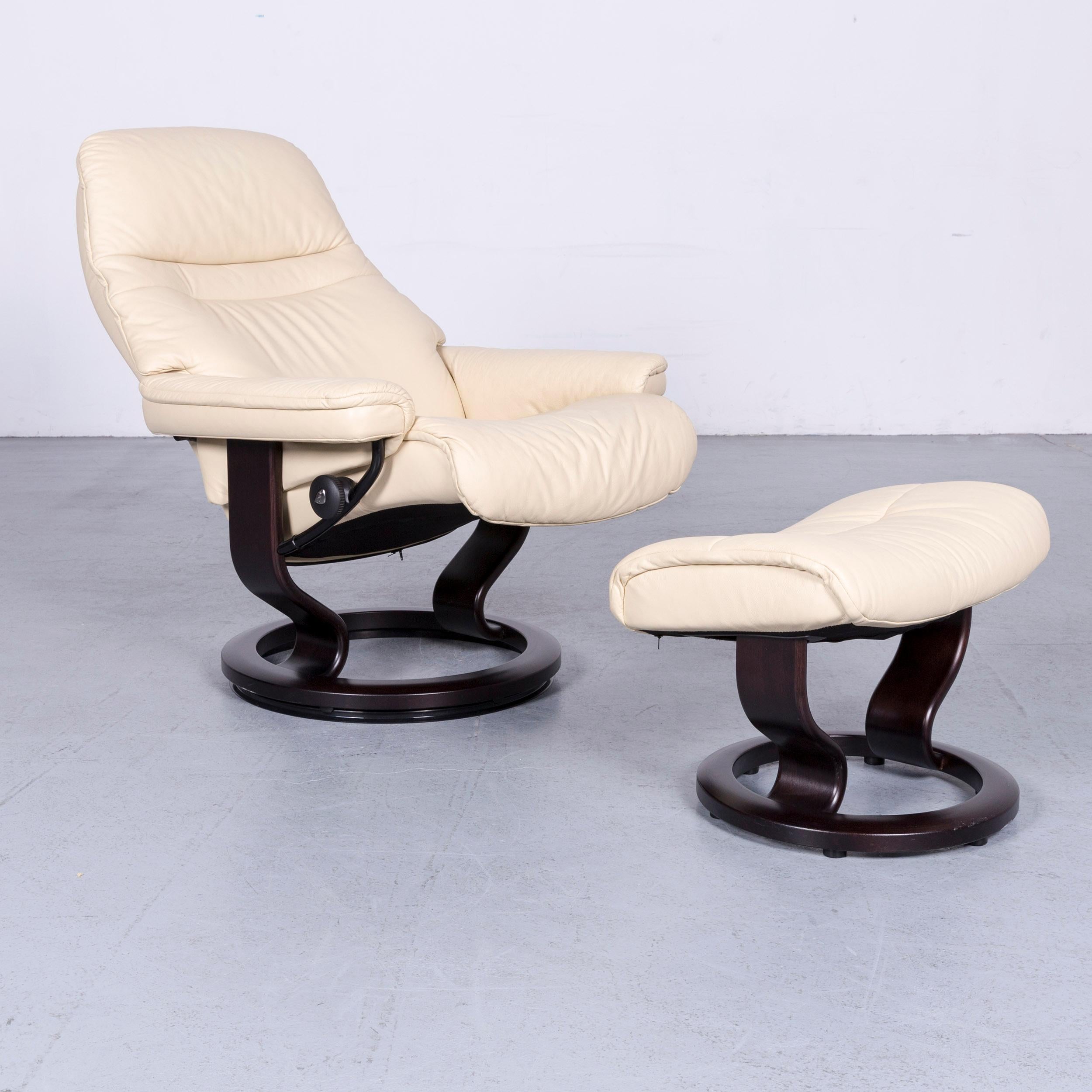 We bring to you an Ekornes Stressless designer leather armchair beige with stool.