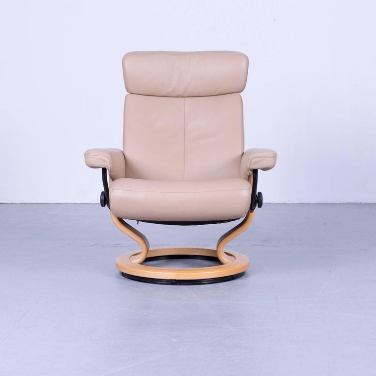 Ekornes Stressless Orion Armchair and Footstool Beige Leather Recliner Chair For Sale at 1stDibs