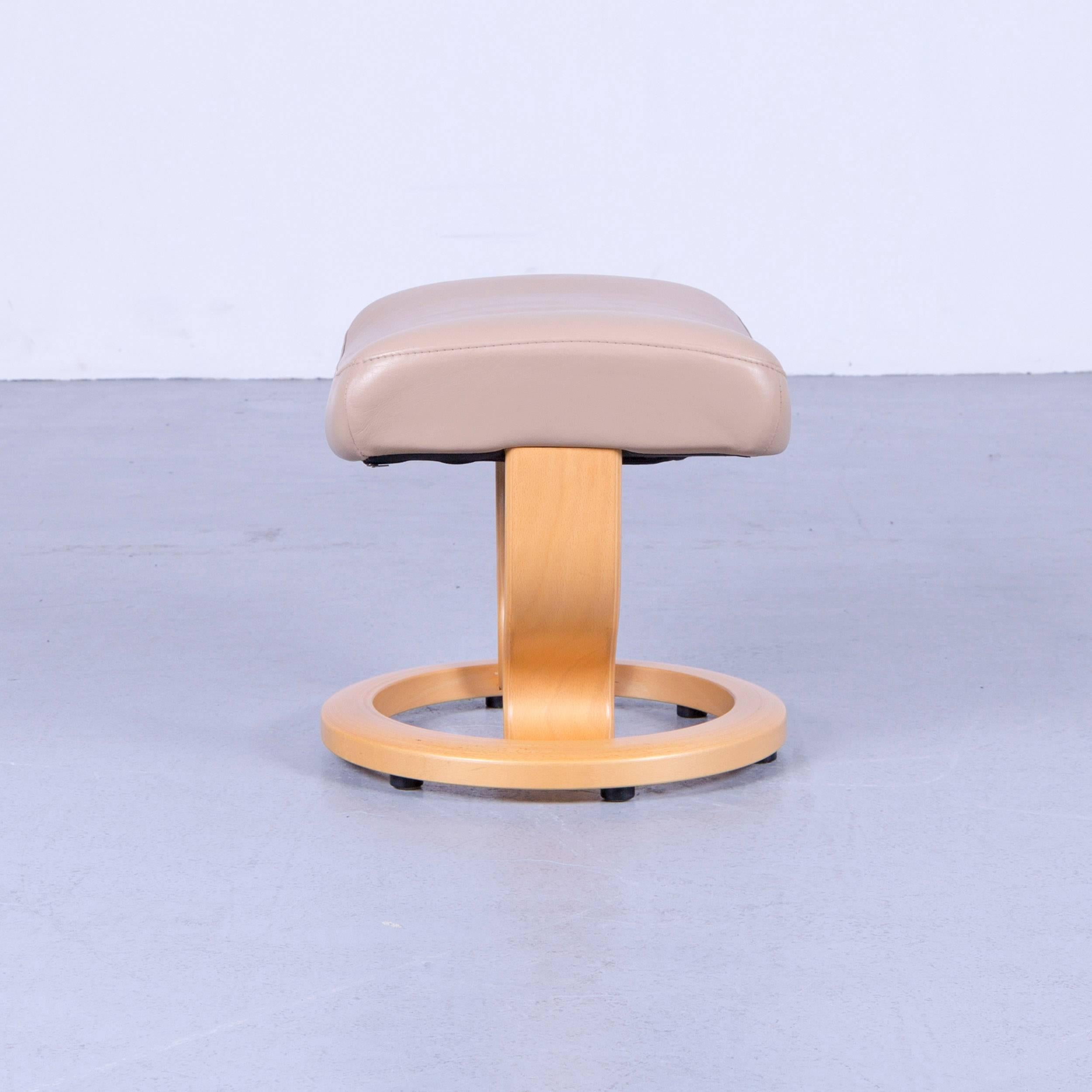 Ekornes Stressless Orion footstool beige leather modern footrest designer wood, made for pure comfort and flexibility.
