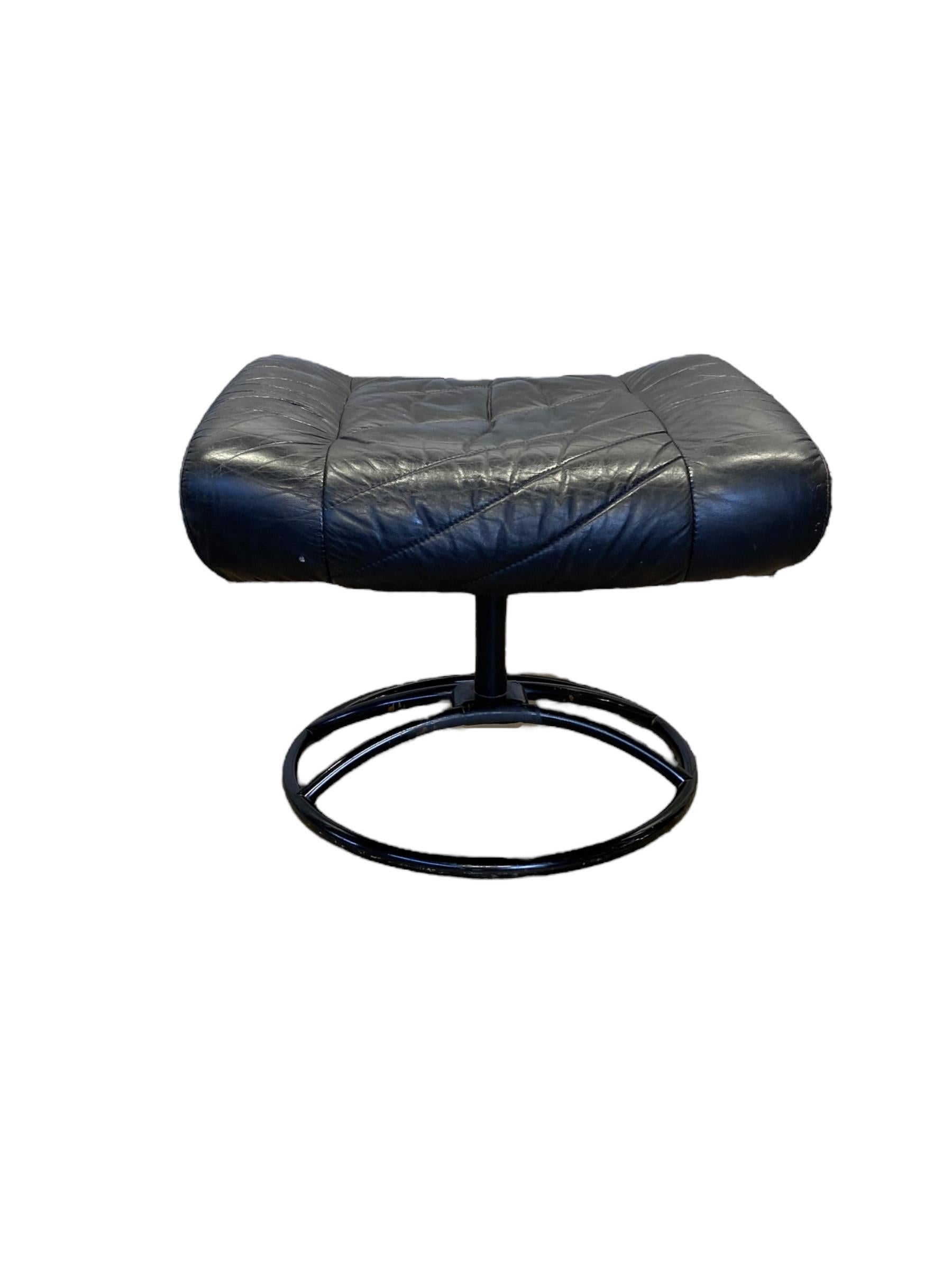 Ekornes Stressless ottoman footstool in black leather and black finish metal frame. Good vintage condition. 