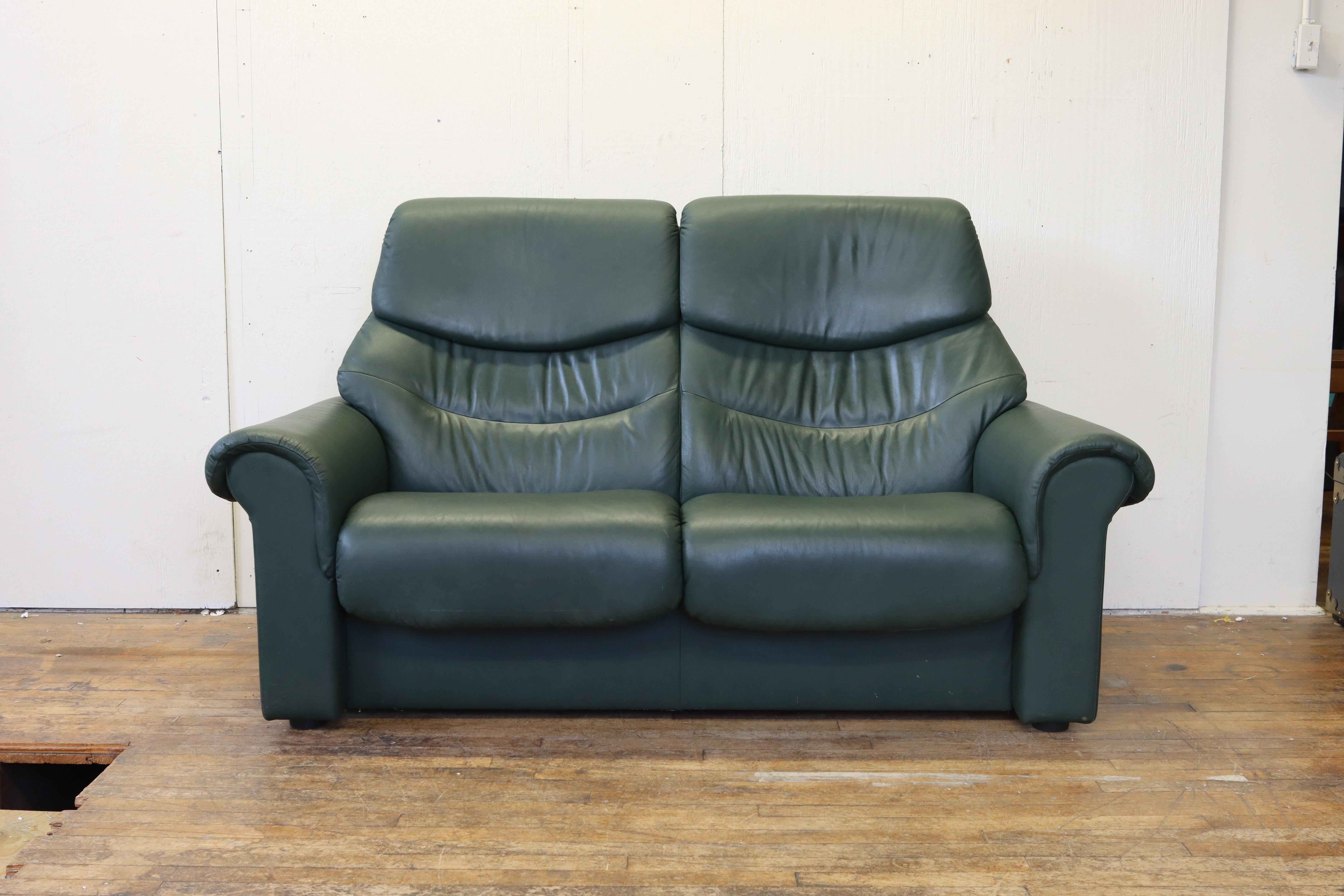 Add some top level comfort to your space with this reclining leather loveseat by Ekornes Stressless of Norway. Ekornes has developed a cult following over the decades for the comfort and quality of their furniture and this piece is no exception.
