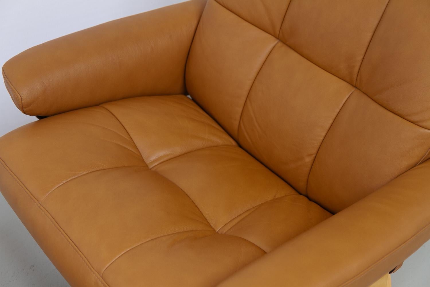 Ekornes Stressless Reclining Lounge Chair and Ottoman, 2000s. 9