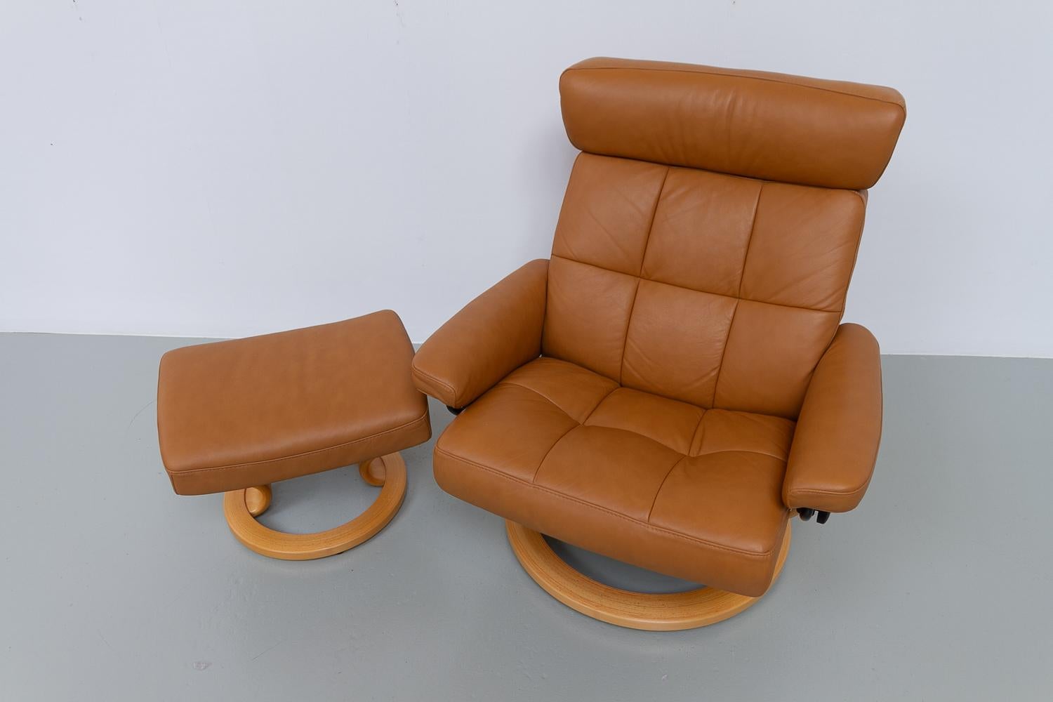 Ekornes Stressless Reclining Lounge Chair and Ottoman, 2000s. 10