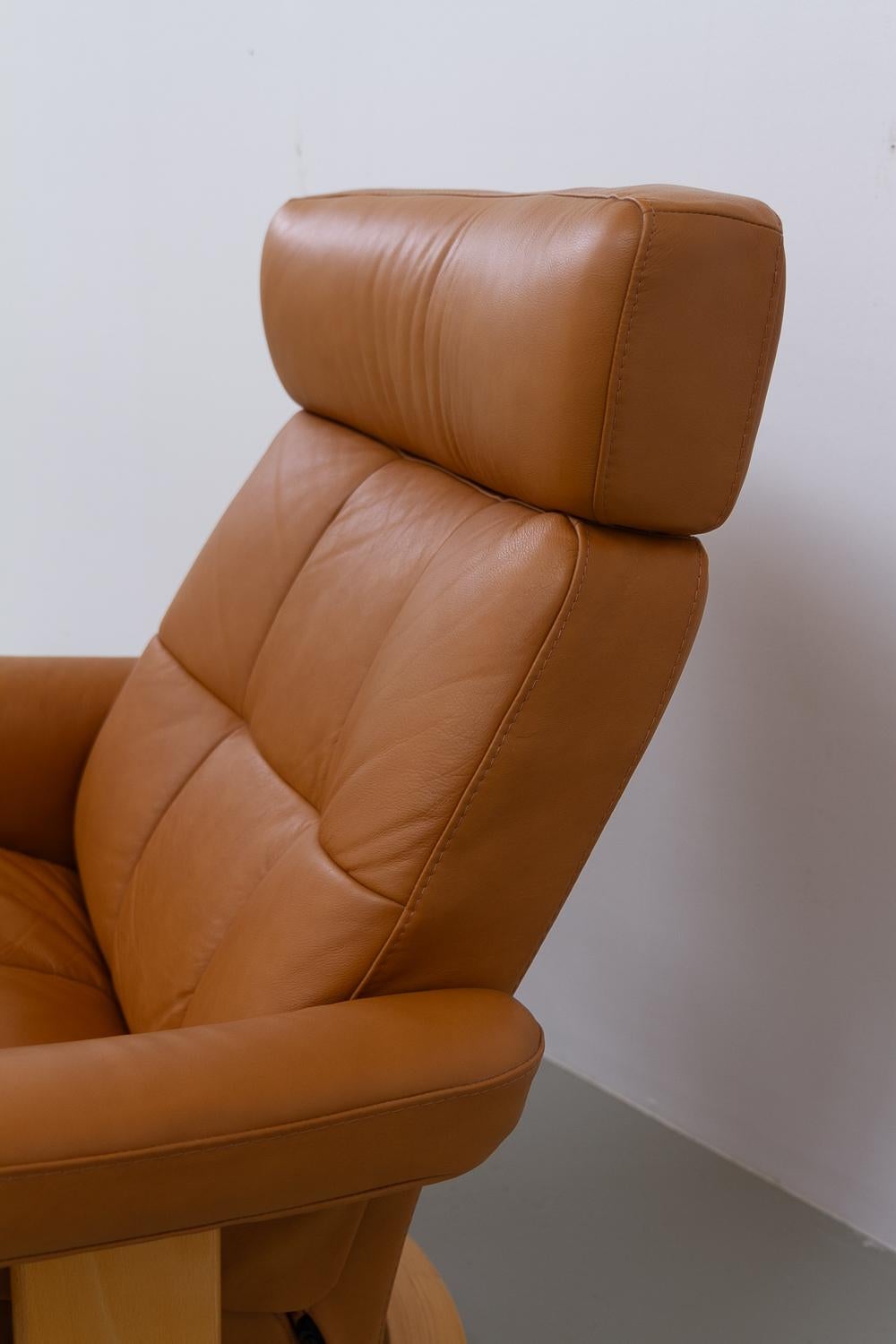 Ekornes Stressless Reclining Lounge Chair and Ottoman, 2000s. 12