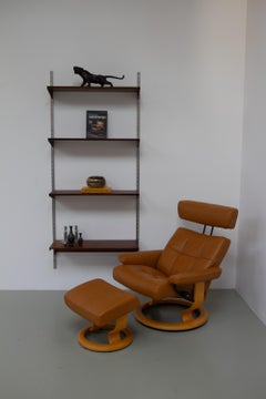 Ekornes Stressless Reclining Lounge Chair and Ottoman, 2000s.