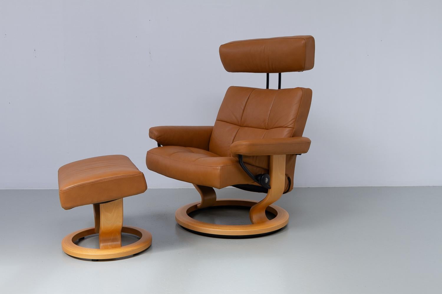 Ekornes Stressless Reclining Lounge Chair and Ottoman, 2000s. 1