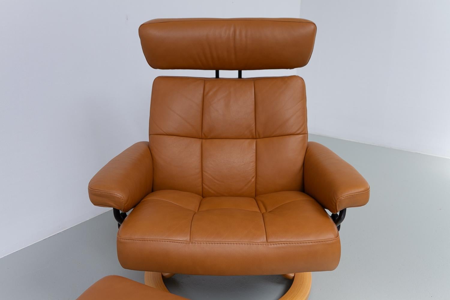 Ekornes Stressless Reclining Lounge Chair and Ottoman, 2000s. 2