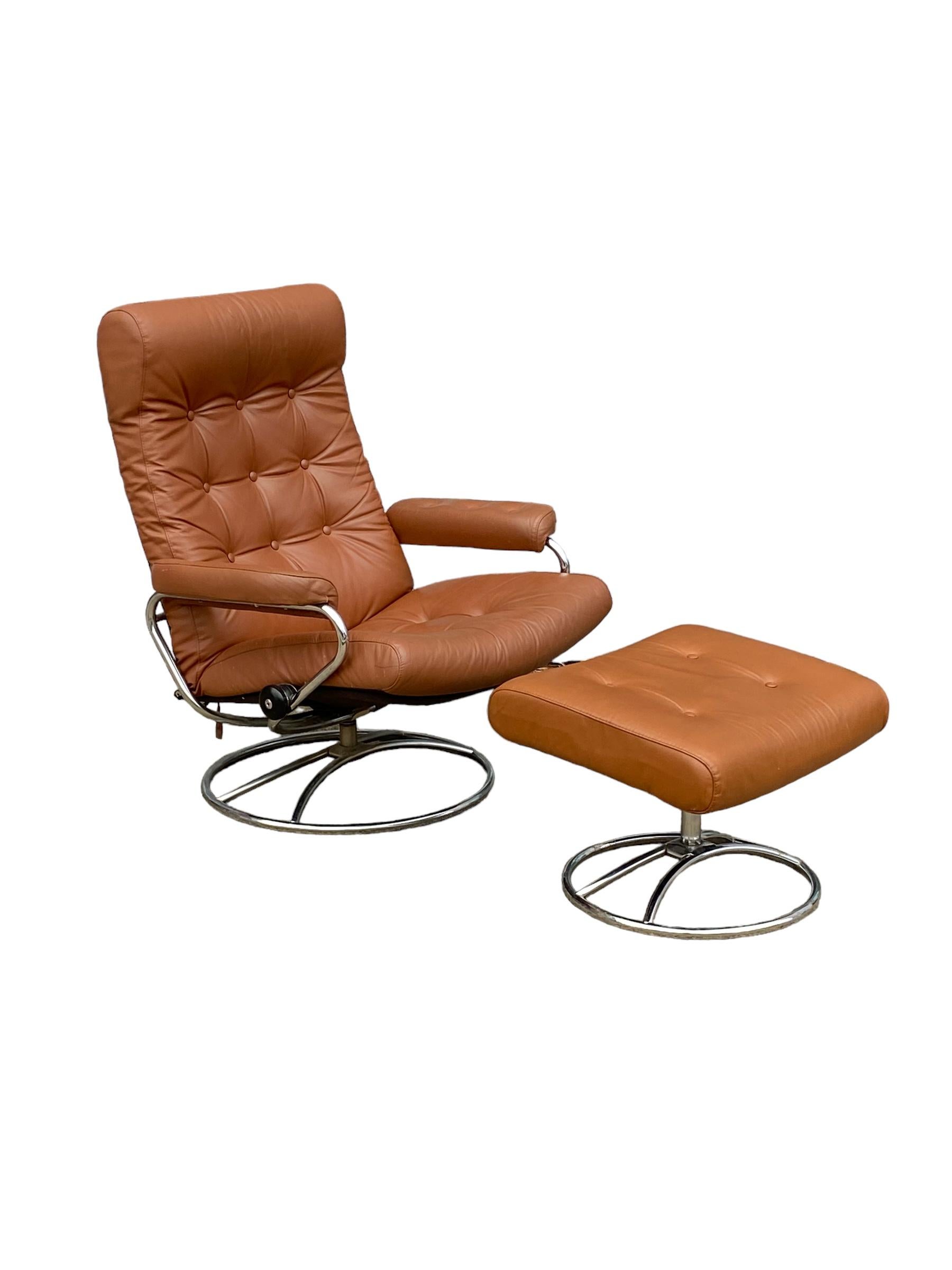 Ekornes Stressless reclining lounge chair and ottoman. Elegant mid century Scandinavian design with tubular bent chrome frame and cognac brown leather cushion. Lounge in comfort with this timeless design.