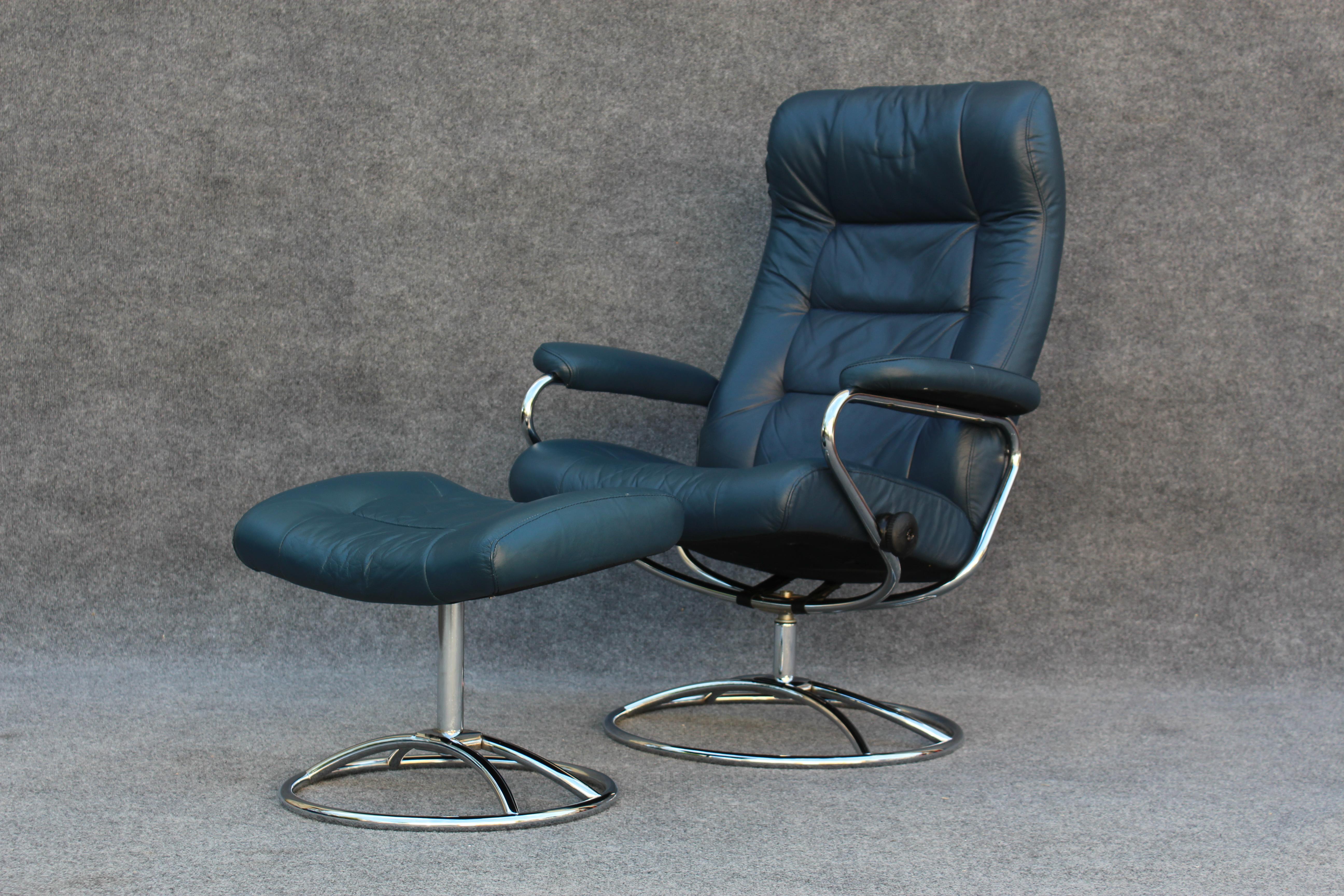 Made by Danish company Ekornes, this chair and ottoman combo is part of their Stressless line of lounge chairs. Like their other chairs, this model is very comfortable and fully adjustable to an almost horizontal position. Set on a dynamic chromed