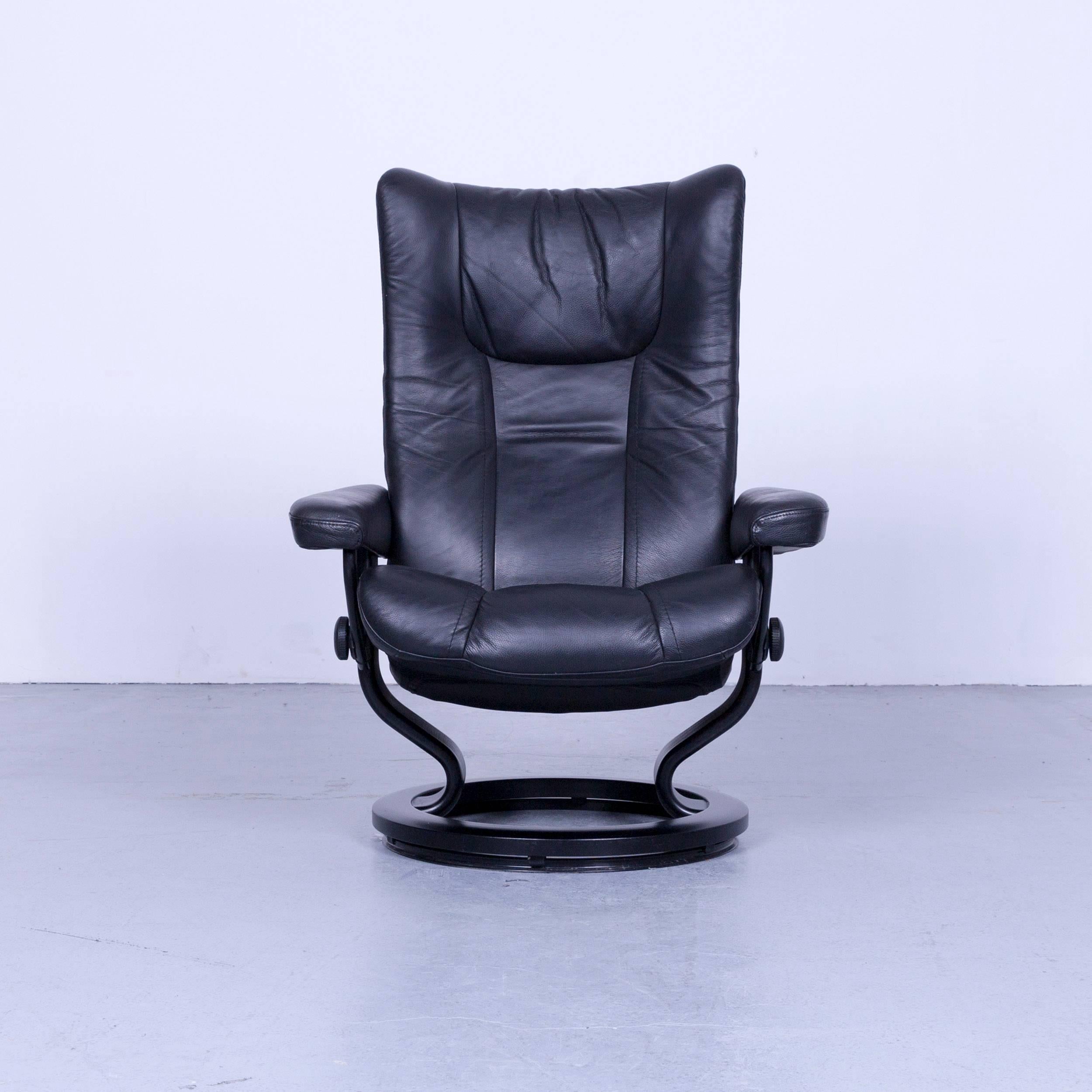 Ekornes Stressless wing armchair black leather modern recliner chair designer, with convenient functions, made for pure comfort and flexibility.