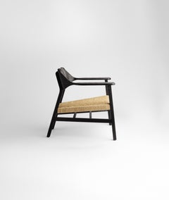 El Aviador "The aviator" Burnished and Wicker Armchair by Adriane Escarfullery