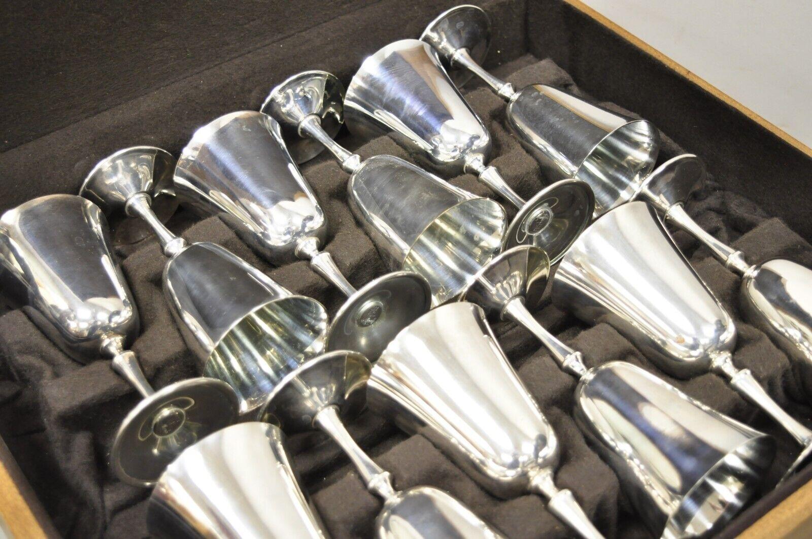El De Uberti Italy silver plated cup goblets set - 12 pc set with box case. Item features (12) goblets, original wooden case, marked to underside of goblets, wooden case: 4.5 H x 20 W x 17 D, very nice vintage set. Circa Mid 20th Century.
