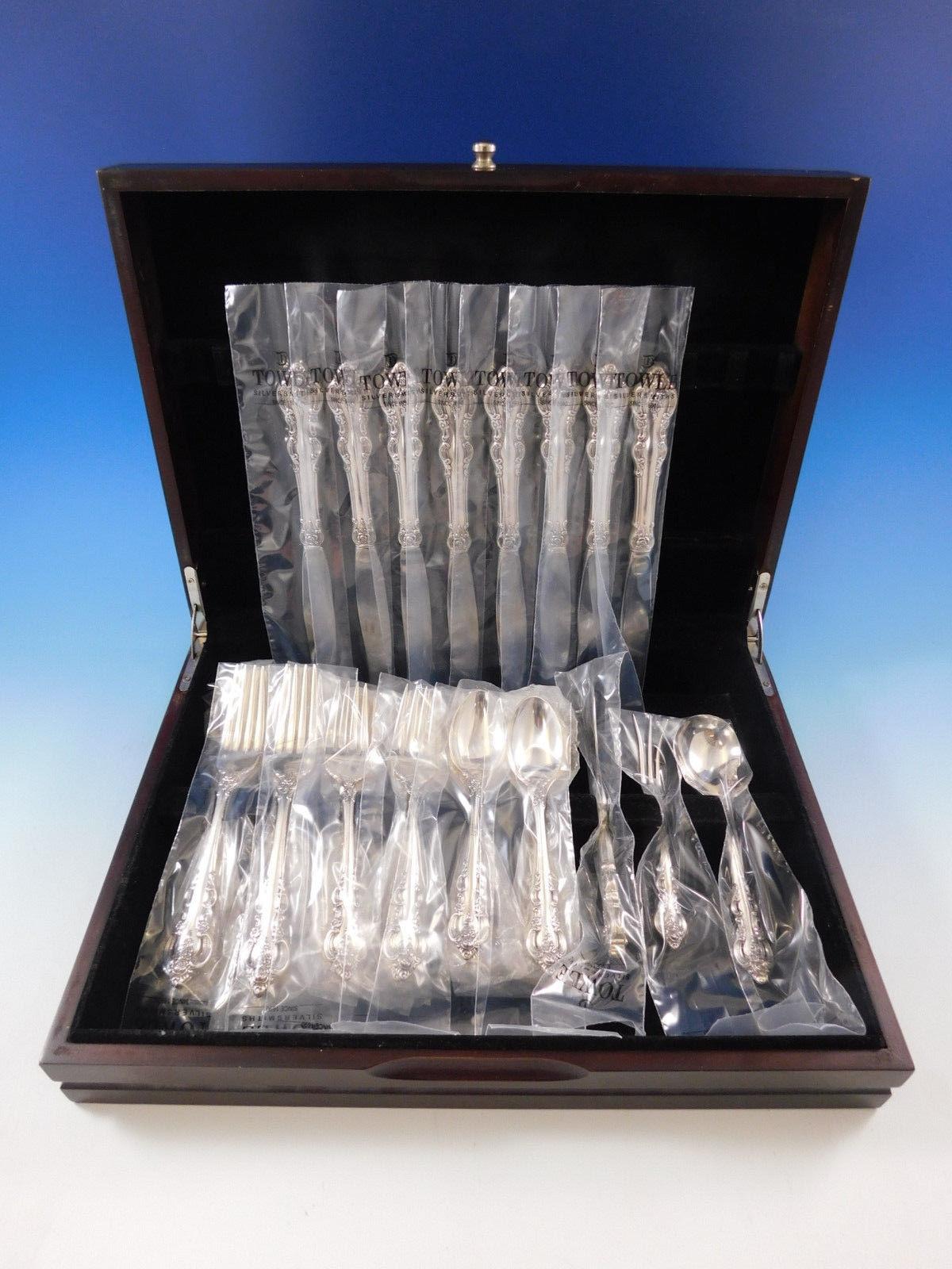 Lavish, handcrafted detailing graces the stem and handle of this pattern. El Grandee is a richly designed, highly sophisticated addition to any formal setting.

New in factory sleeves El Grandee by Towle sterling silver flatware set of 35 pieces.