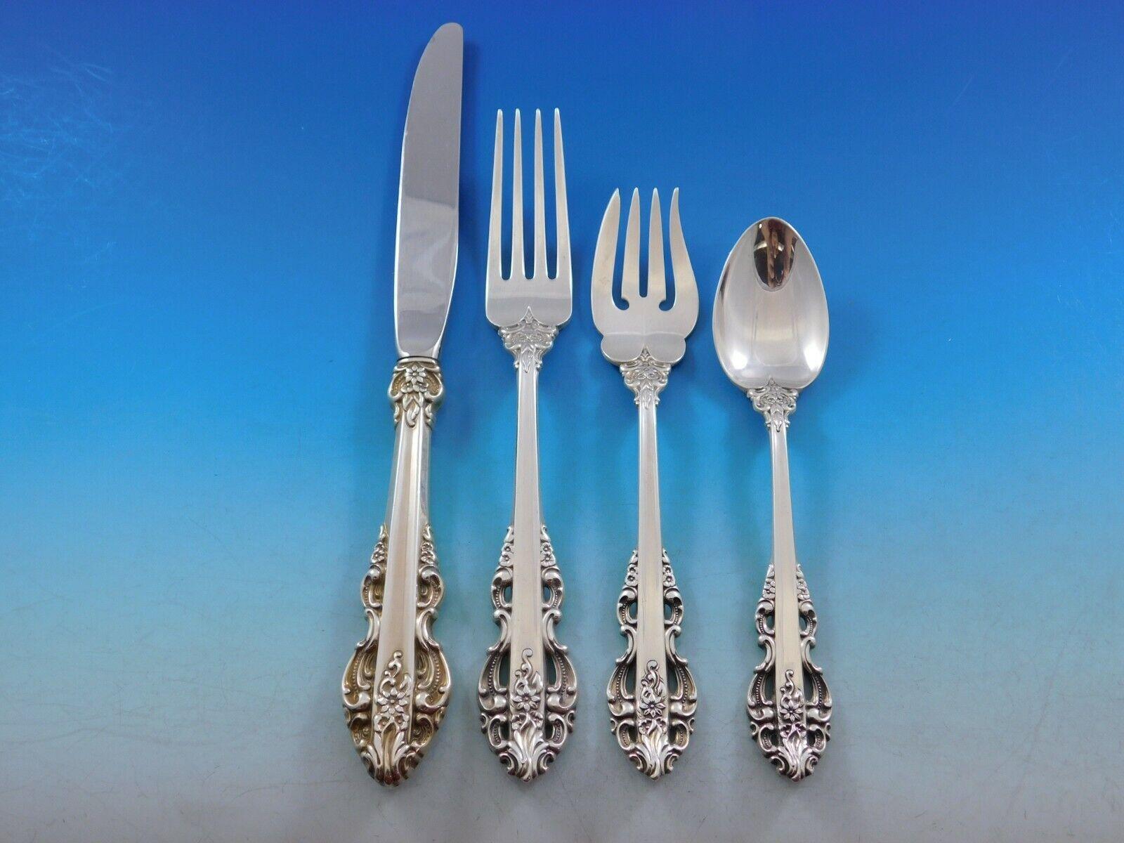 Set di posate in argento sterling El Greco di Reed & Barton del 1972 circa con manico traforato - 52 pezzi. Questo set comprende:

12 coltelli, 9 3/8