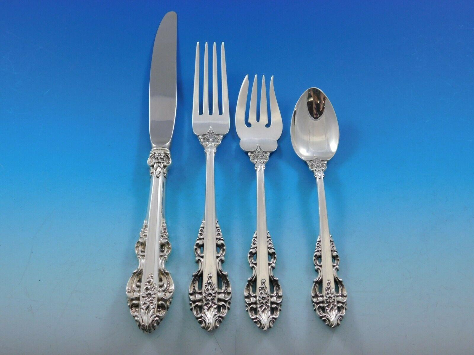 El Greco by Reed & Barton circa 1972 sterling silver flatware set with unique pierced handle and many unusual pieces - 79 pieces total. This set includes:

12 knives, 9 3/8