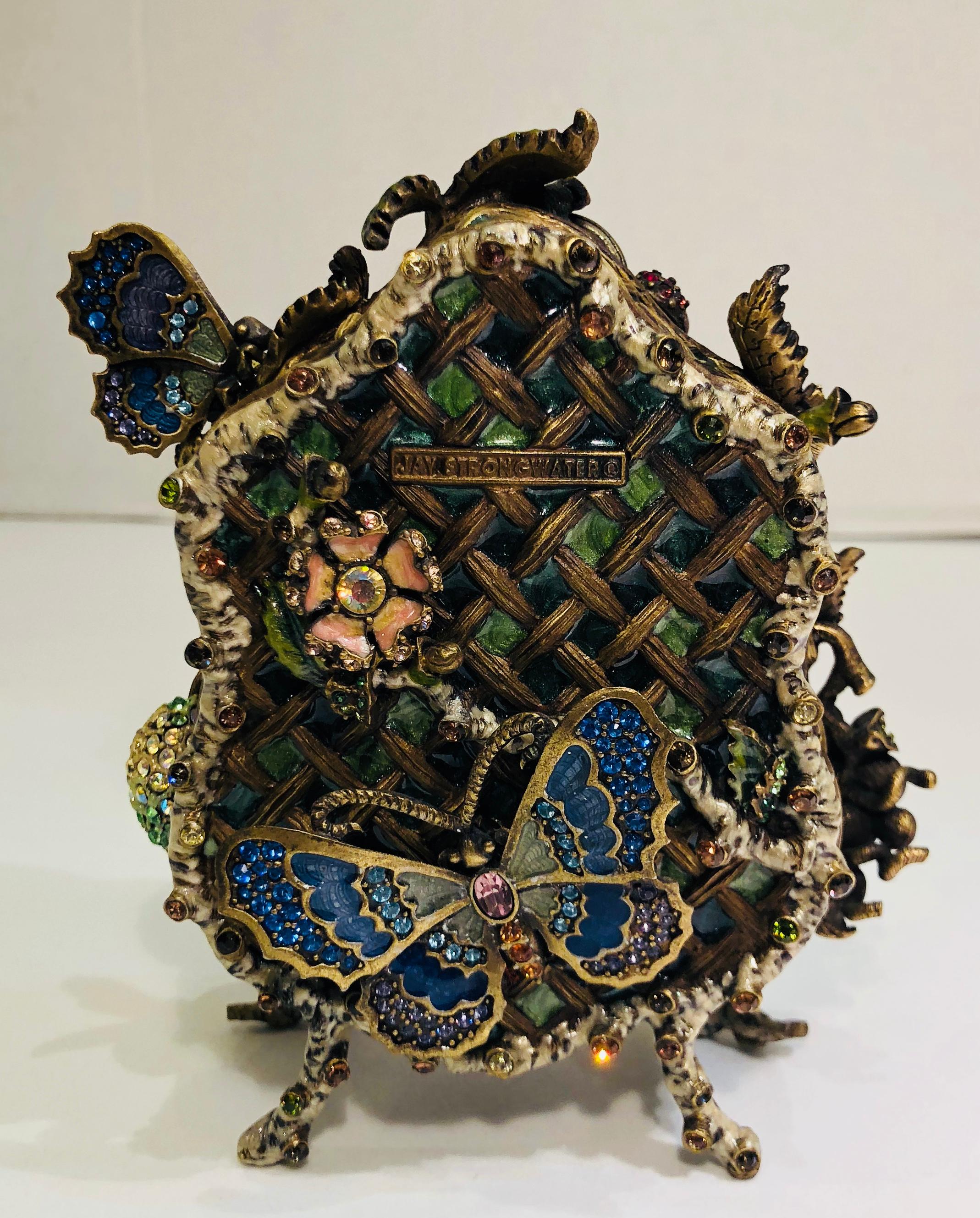 Rare, hard-to-find, estate, retired designer Jay Strongwater English Garden Fruit Trellis Clock for a desk, table or shelf. This gorgeous, handmade and hand painted cast metal enamel decorative clock features a beautifully textured lattice pattern,