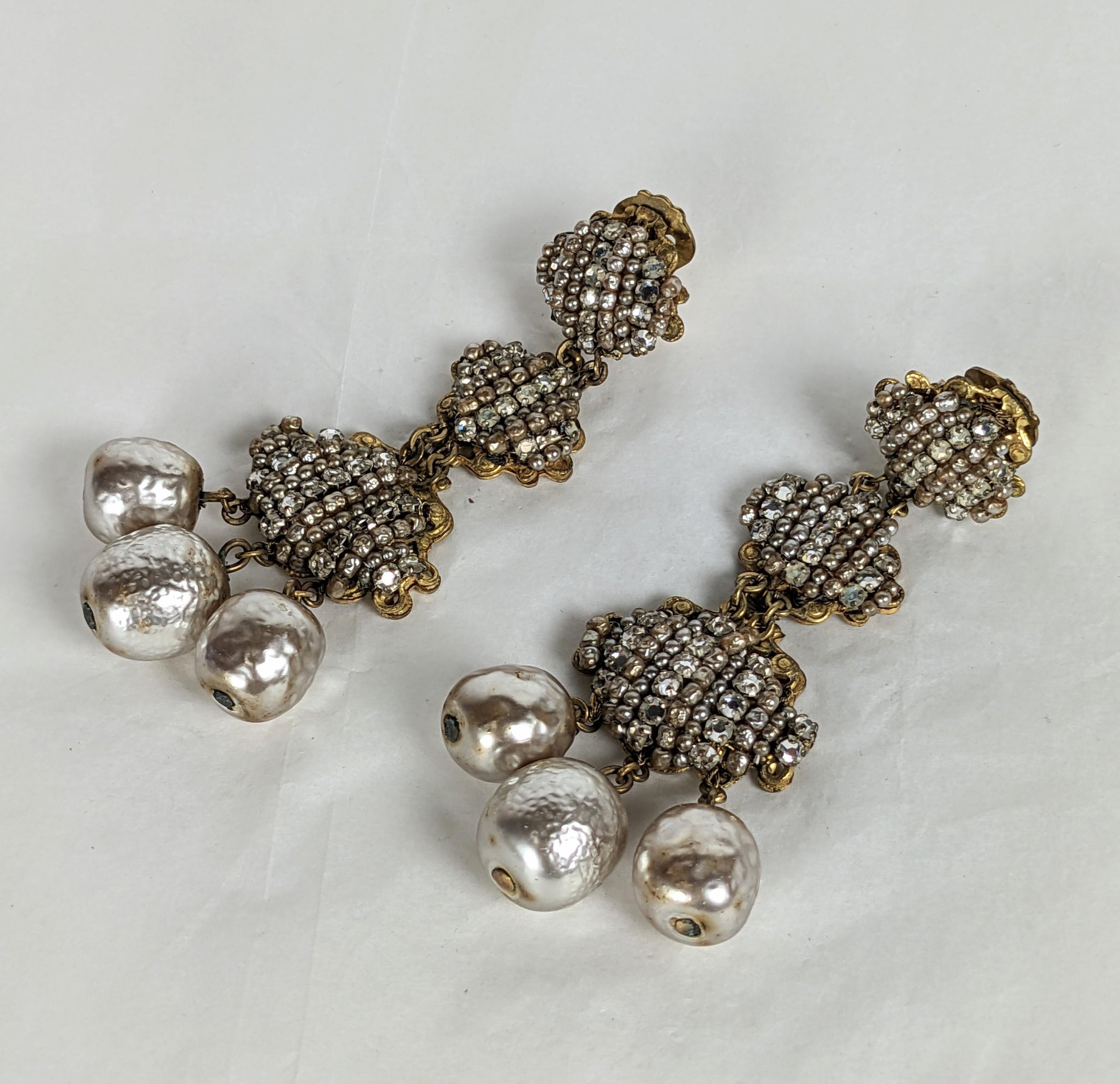 Wonderful Collectible Miriam Haskell Chandelier Earrings from the 1950's. Elaborately hand sewn with signature faux seed pearls and rose montee crystals. Clip back fittings. 1950's USA. 3.25