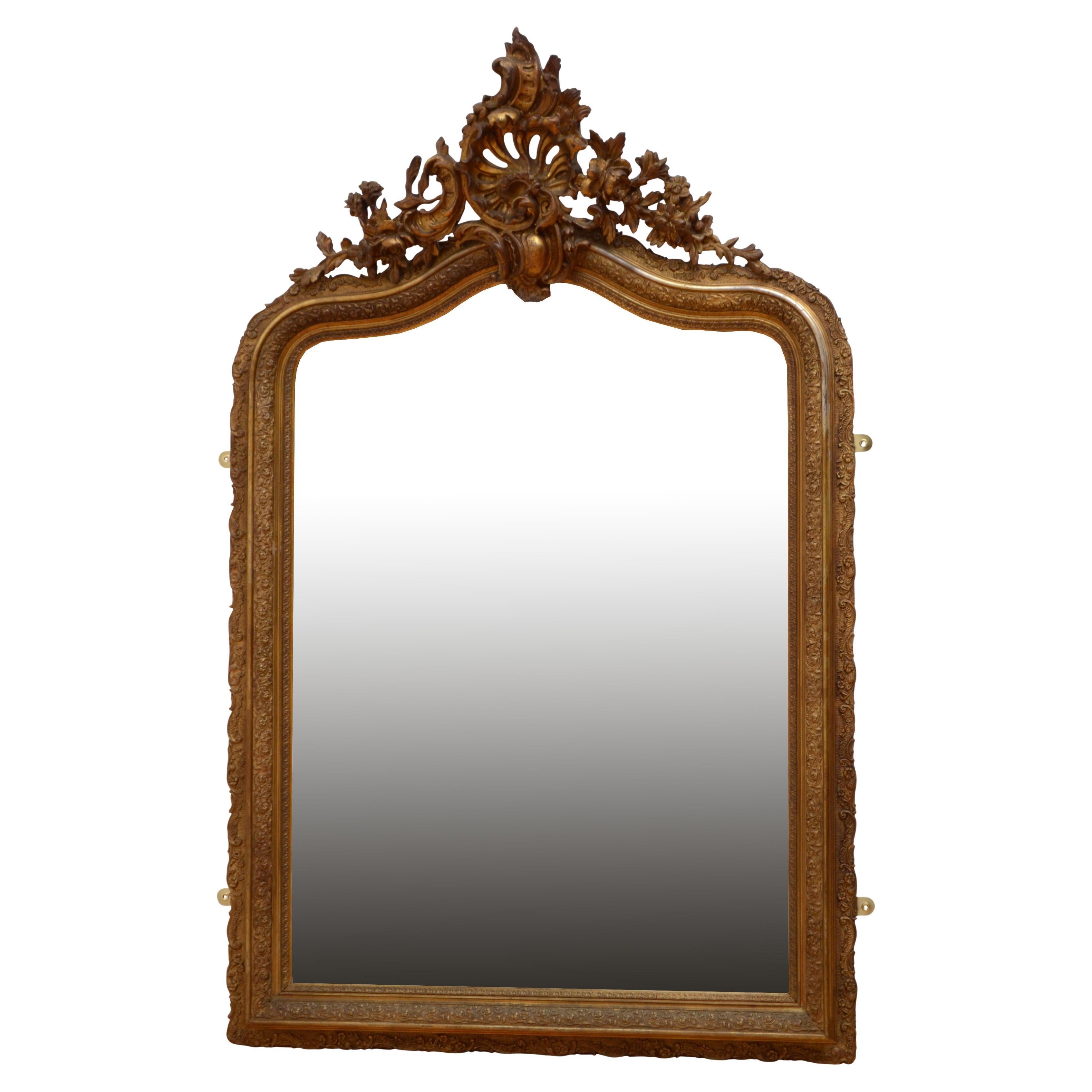 Elaborate XIXth Century Giltwood Mirror For Sale