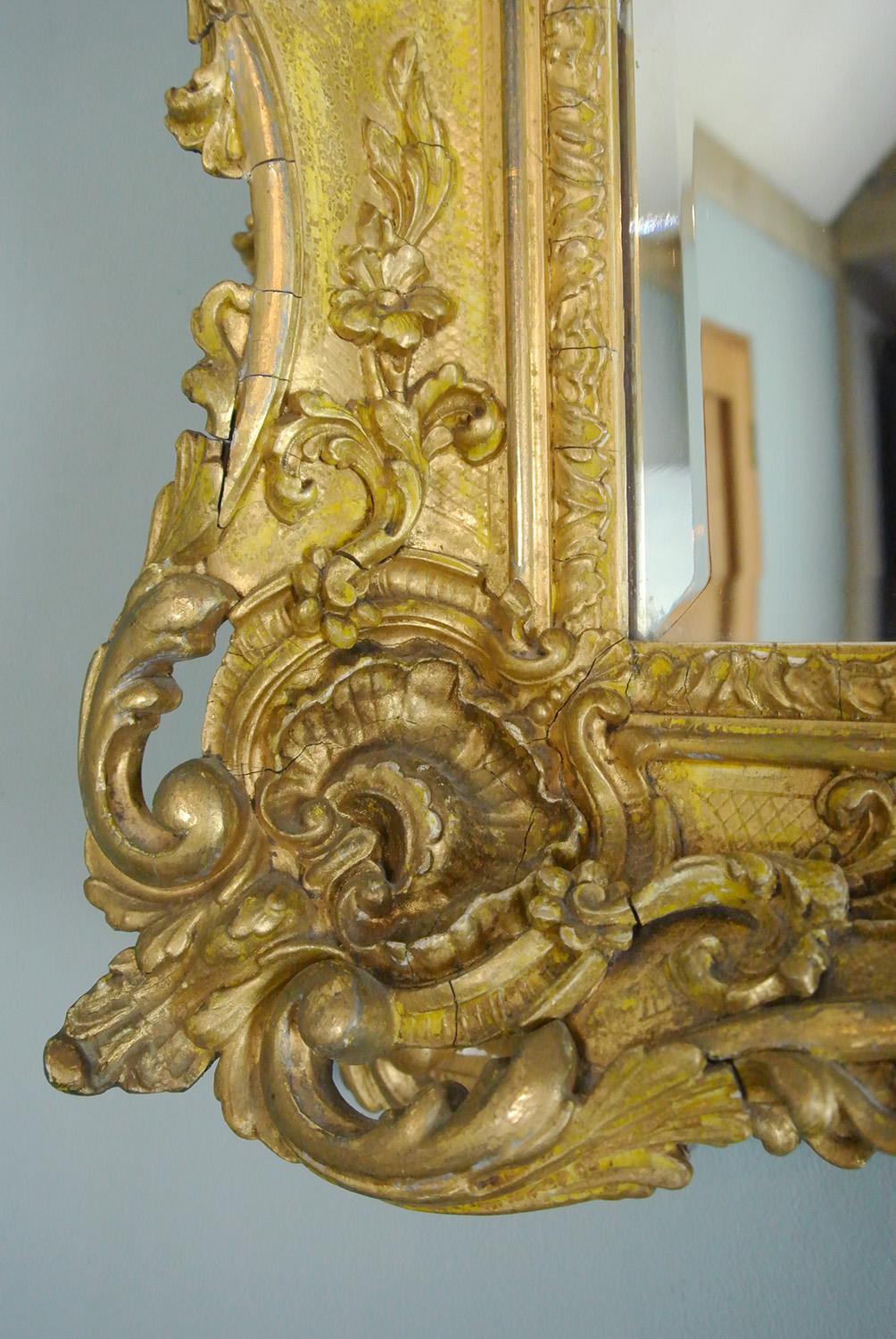 18th Century and Earlier Elaborately Carved and Original Georgian Giltwood Frame with Bevelled Mirror For Sale