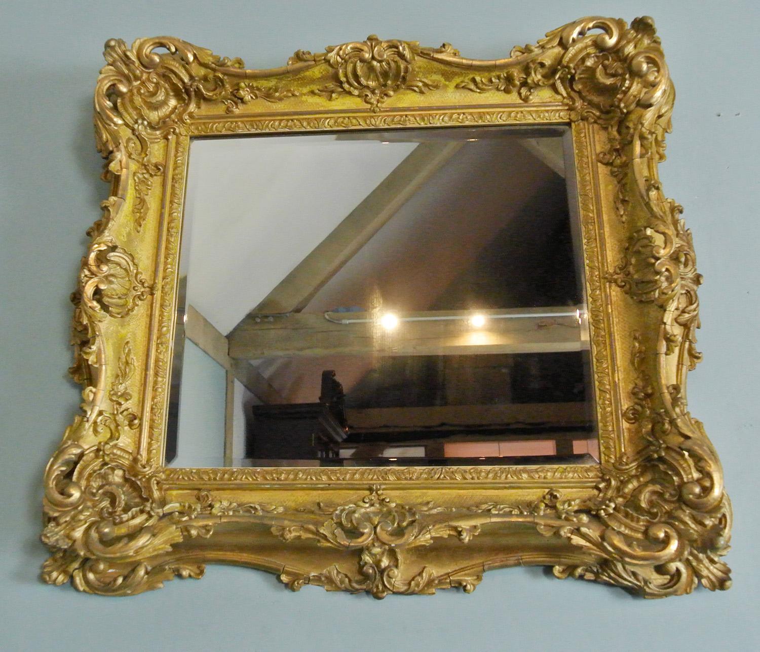 Elaborately Carved and Original Georgian Giltwood Frame with Bevelled Mirror For Sale 1