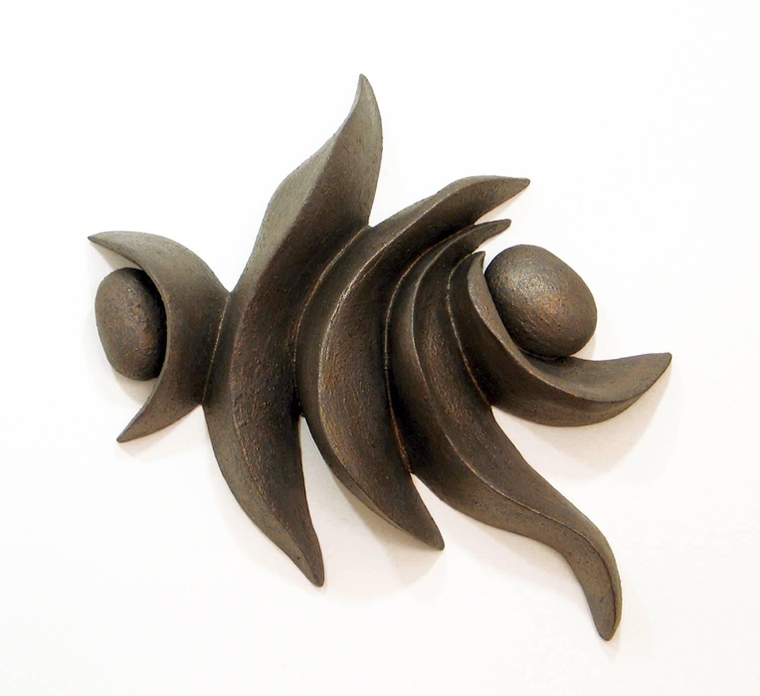 “Against the Others”, ceramic wall forms glazed in dark metallic gold - Sculpture by Elaine Lorenz