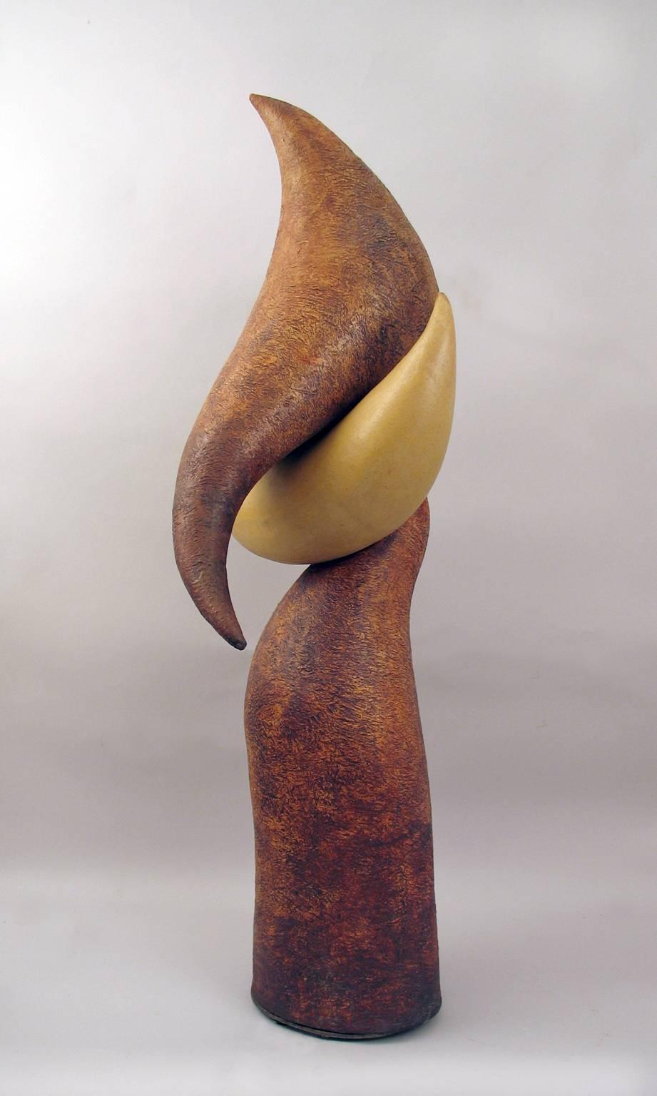 “Balancing Act”, red iron oxide ceramic forms balance daringly  - Sculpture by Elaine Lorenz