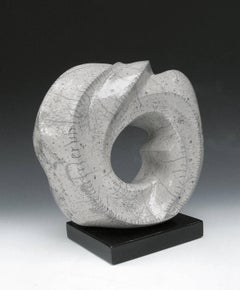 “Encircled”, white crackle glaze Raku ceramic sculpture, carved with portal