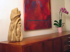 "Growing Out”, a warm golden natural form in textured ceramic evokes summit