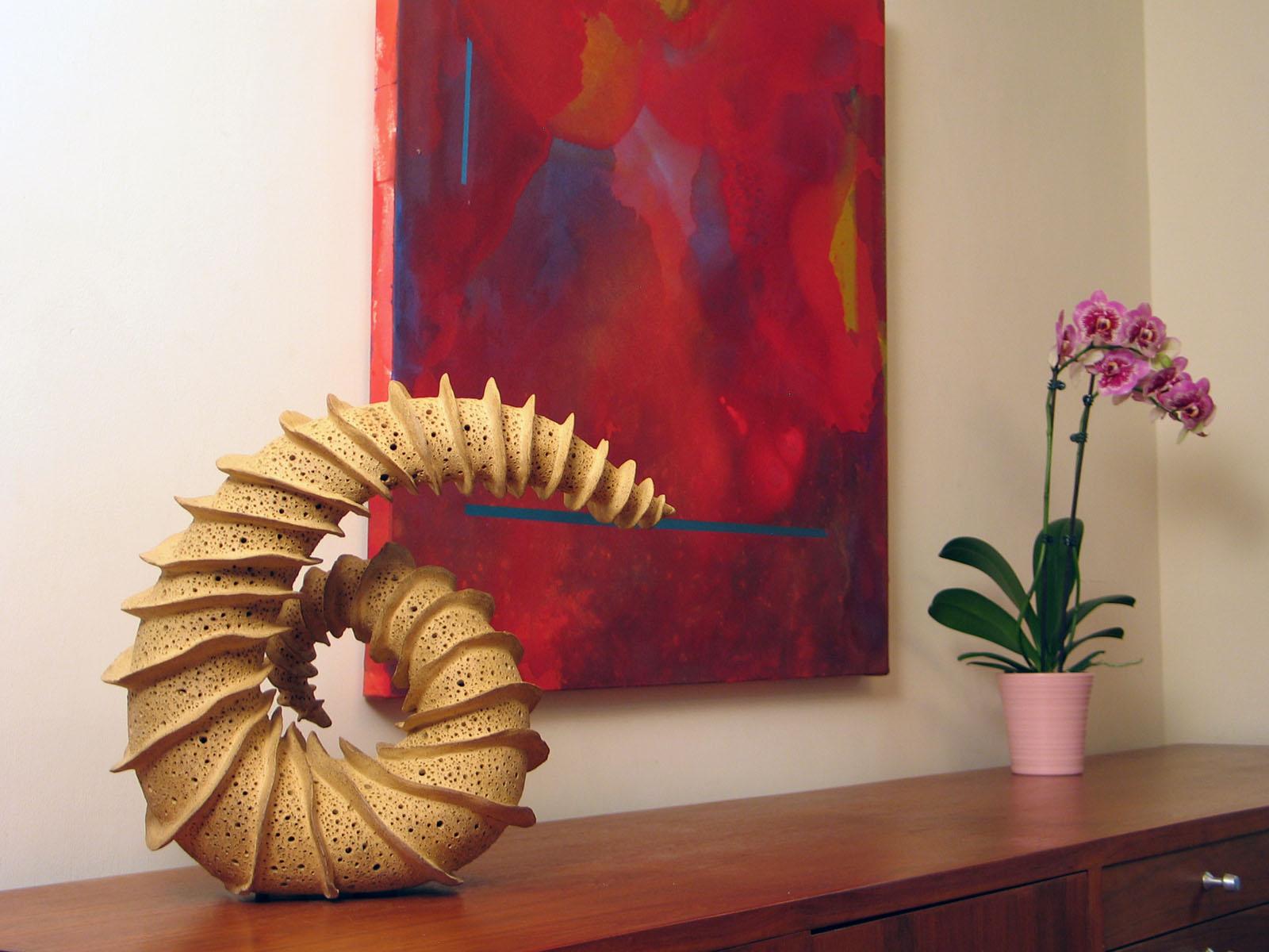  “Looking Back”,  radiates fins spiraling around a tapering coiled ceramic form - Sculpture by Elaine Lorenz